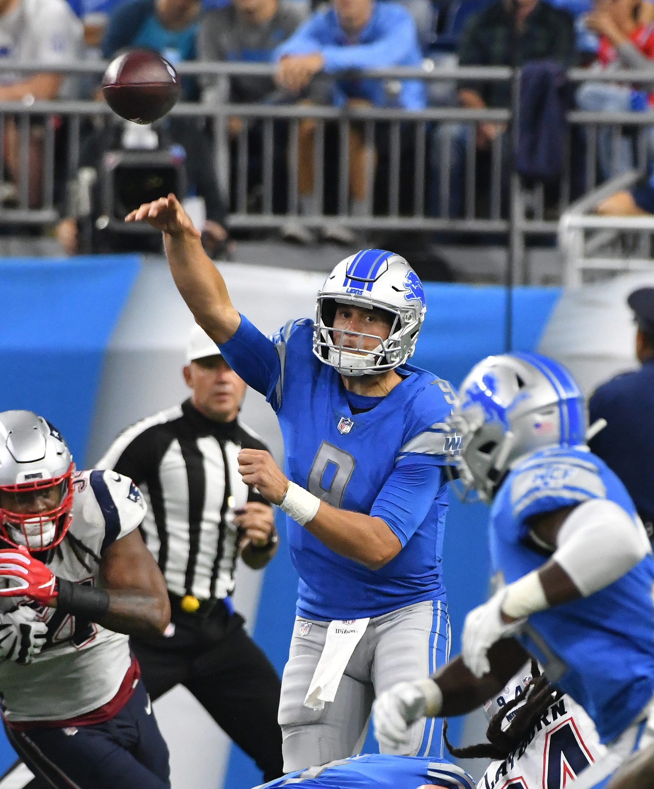 Lions quarterback Matthew Stafford throws in the fourth quarter.