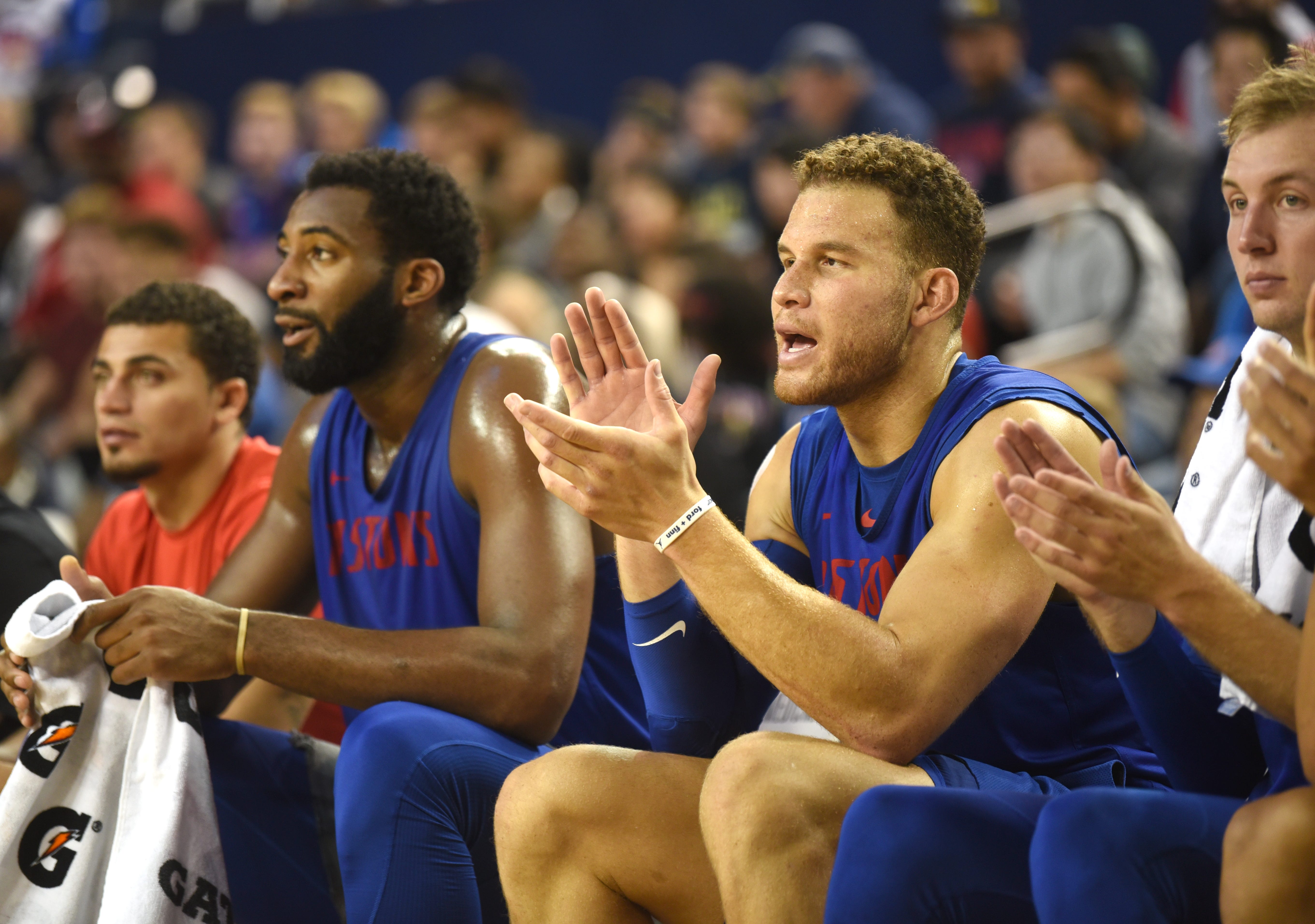 Blake Griffin cheers during an open practice with Andre Drummond.
