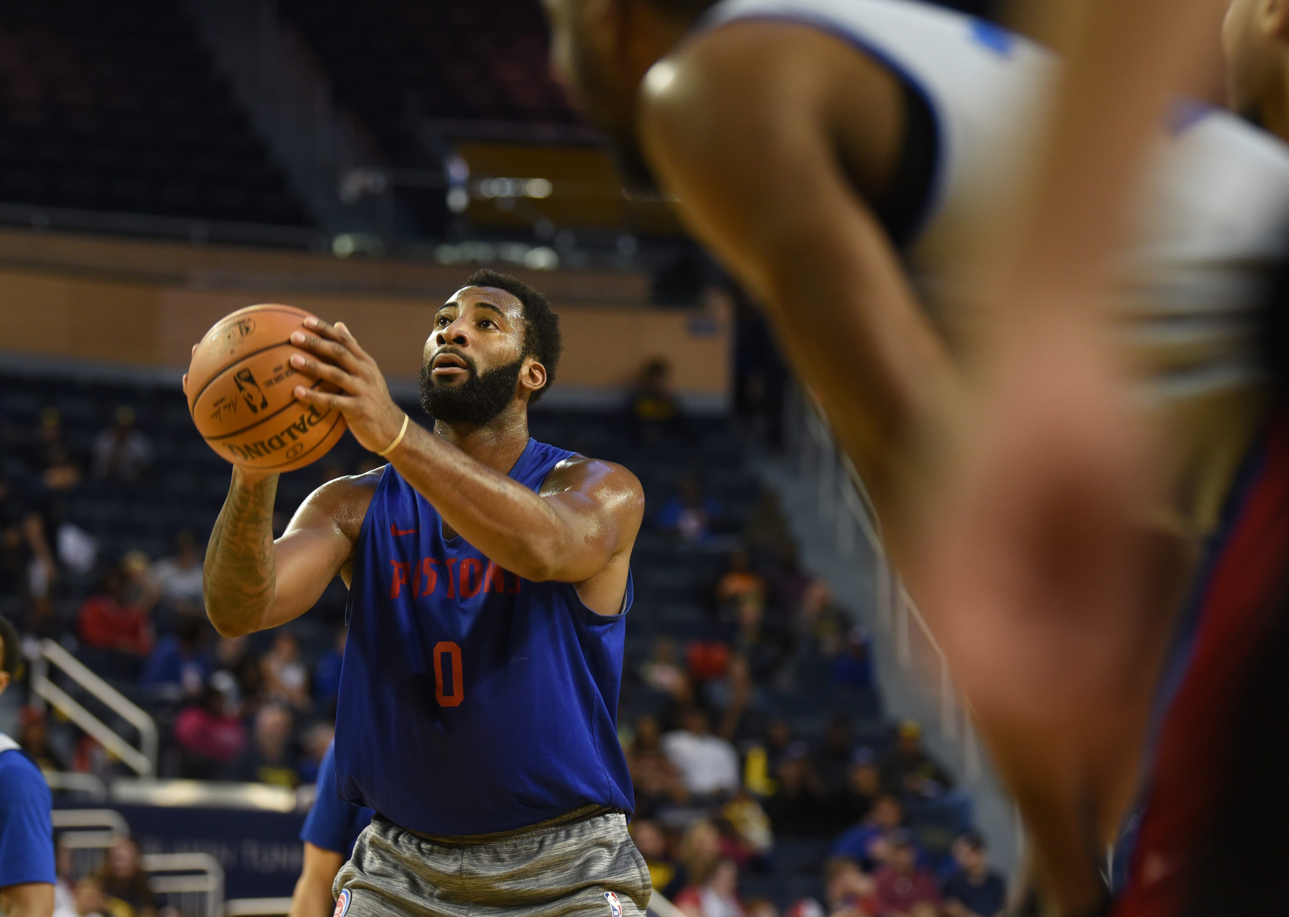 Andre Drummond hits a free throw during open practice.
