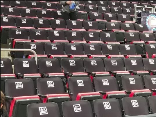 Black seats will become a permanent fixture at Little Caesars Arena.