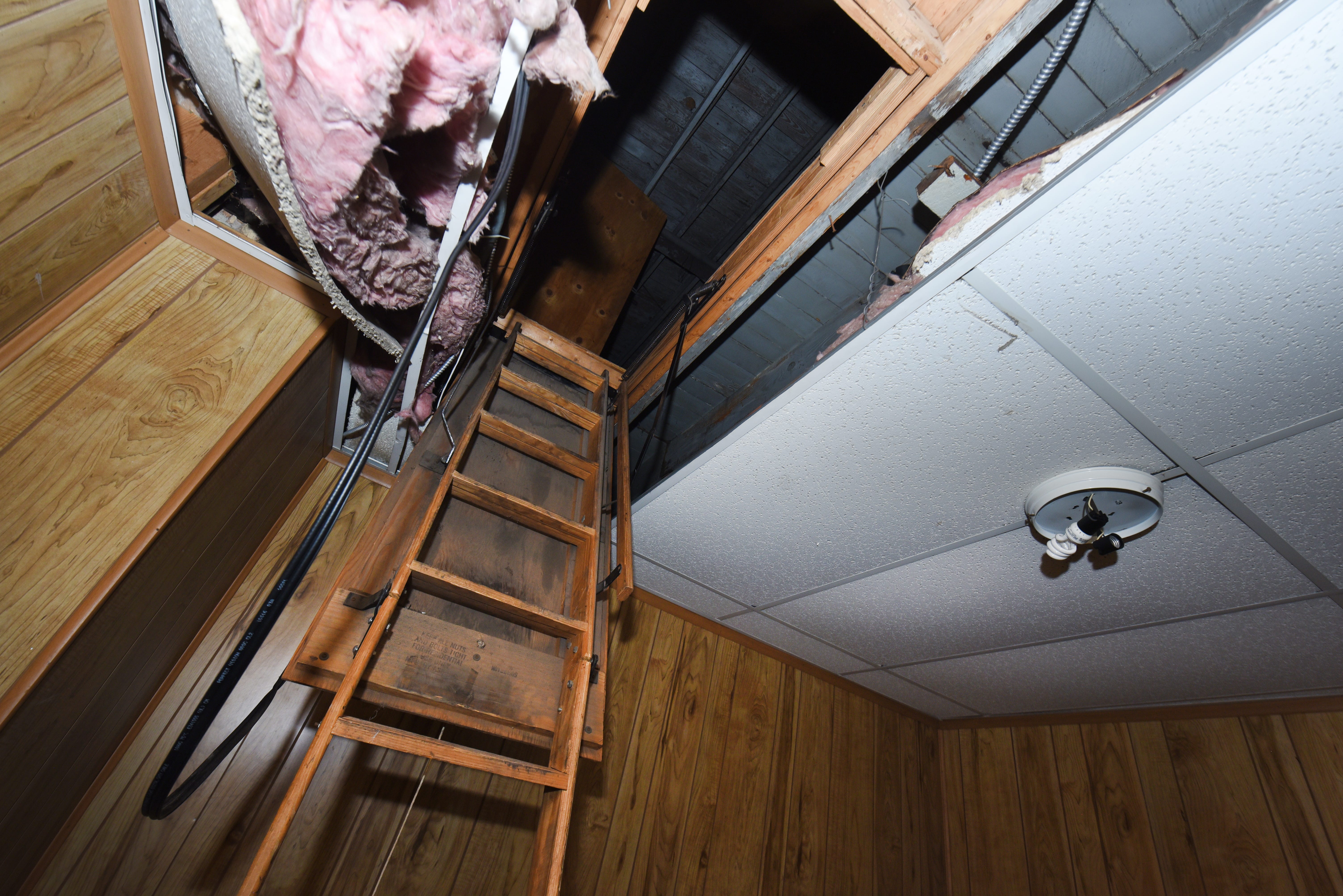 The ceiling compartment where the remains of 11 infants were found hidden inside the former Cantrell Funeral Home.