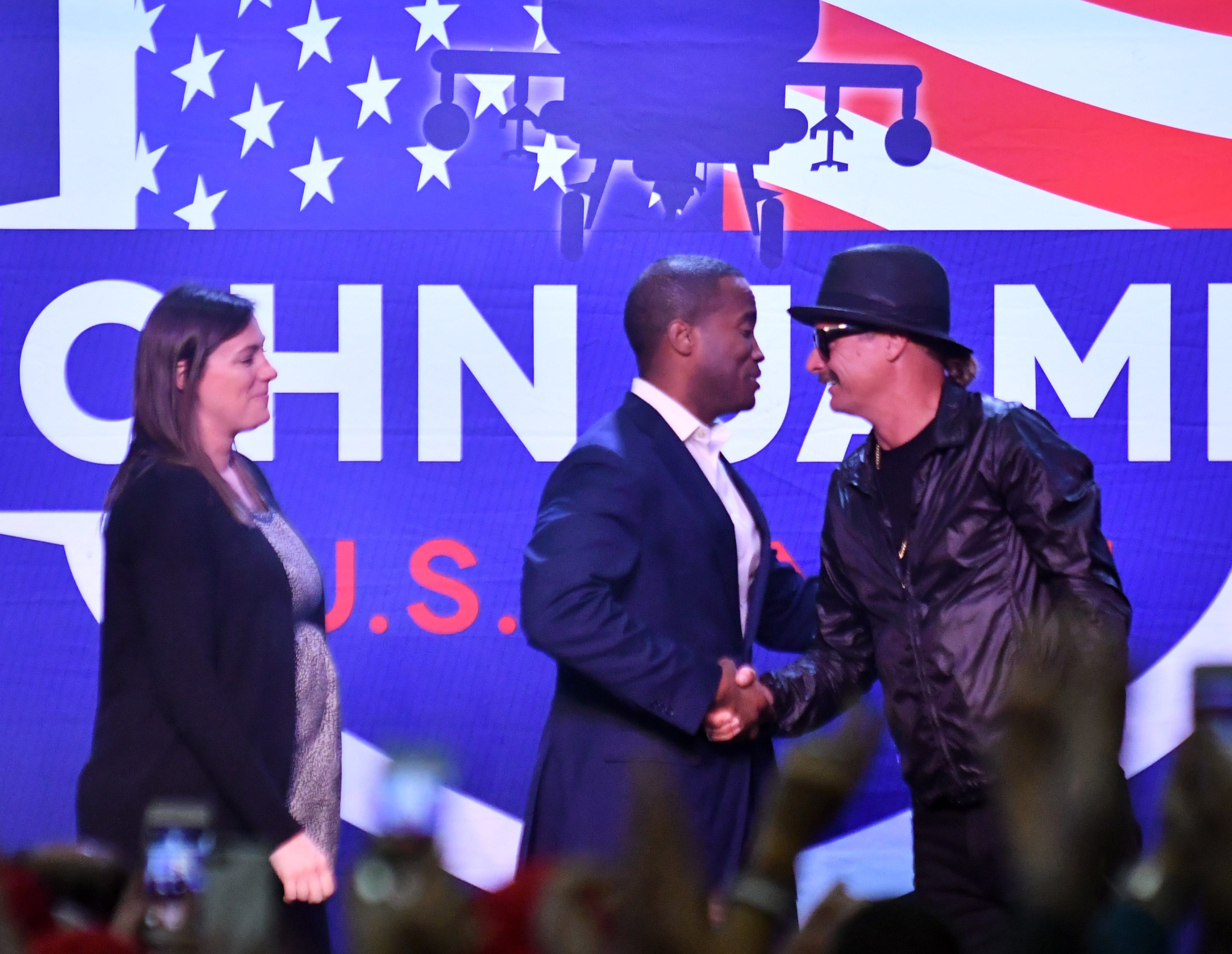 Kid Rock introduces John James and his wife Elizabeth, left, during the rally.    "Protect The American Dream Rally" for Republican candidate for U.S. Senate John James at the Flagstar Strand Theatre in Pontiac, Mich. on Oct 17, 2018.