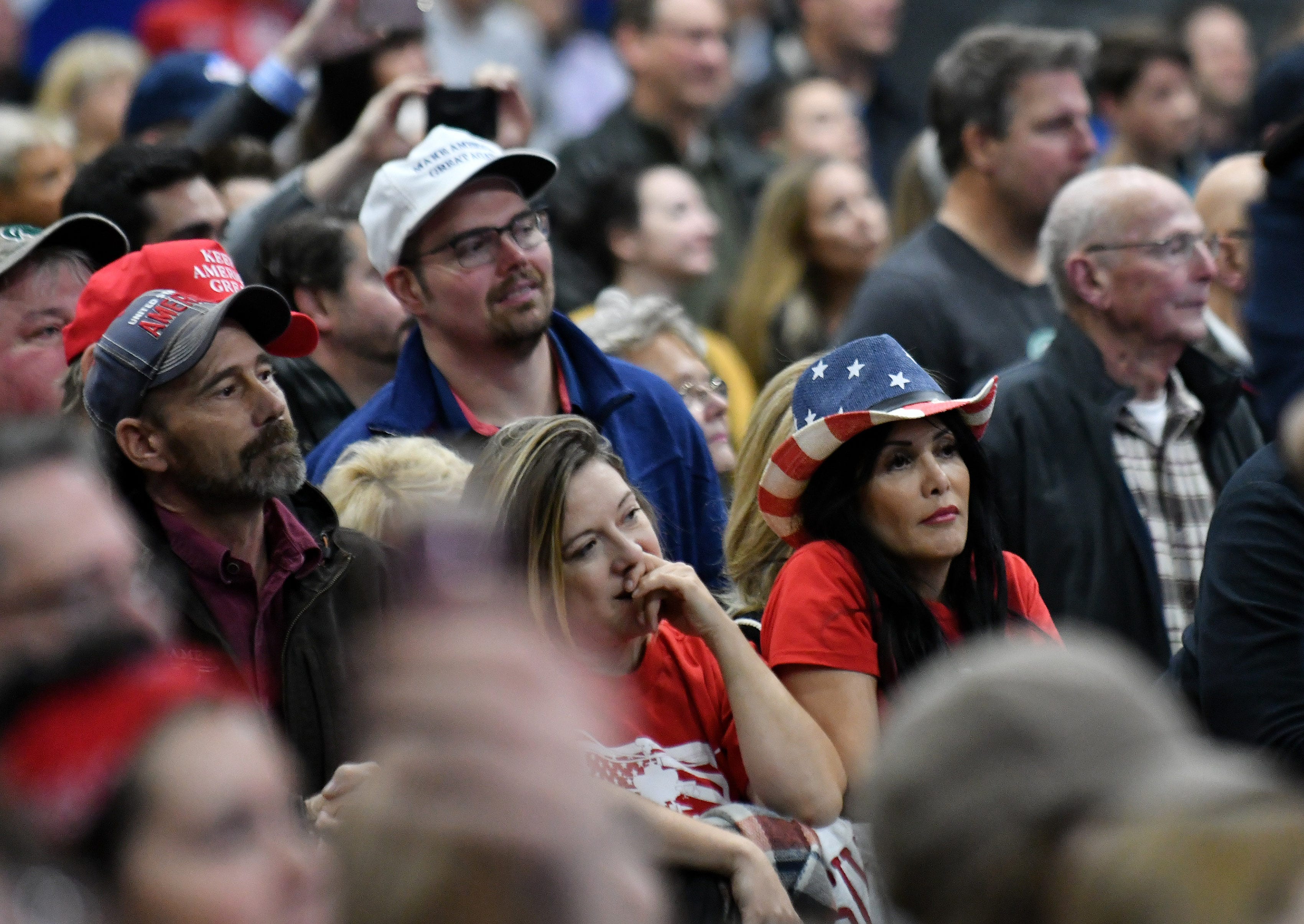 Supporters listen to Ted Nugent during the rally.