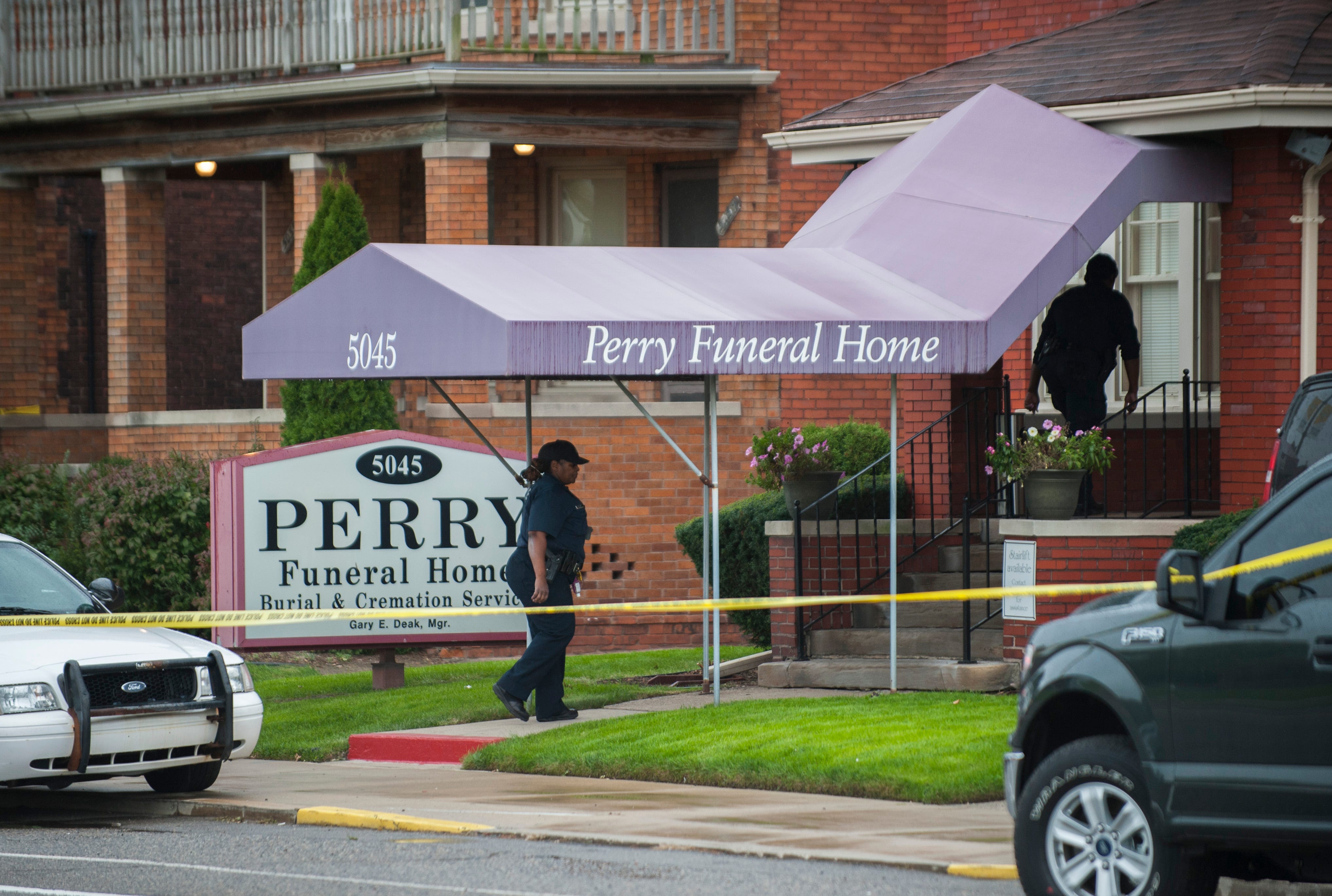 Detroit Police execute a search warrant at Perry Funeral Home in Detroit Friday afternoon, October 19, 2018. "We served a warrant there," Detroit Police Chief James Craig said. "We're looking for evidence of improper disposal of remains or any other improprieties."