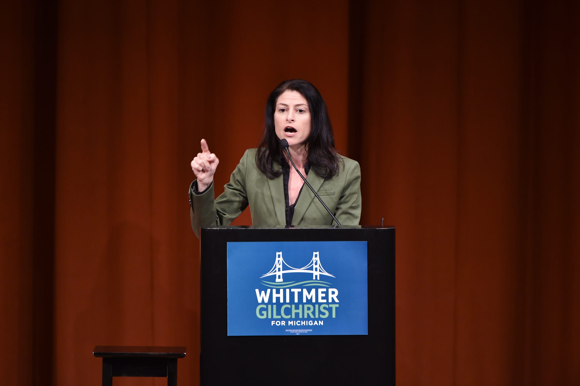 Dana Nessel, nominee for attorney general, addresses a campaign rally for Michigan Democrats Friday at Rackham Auditorium on the campus of the University of Michigan in Ann Arbor.