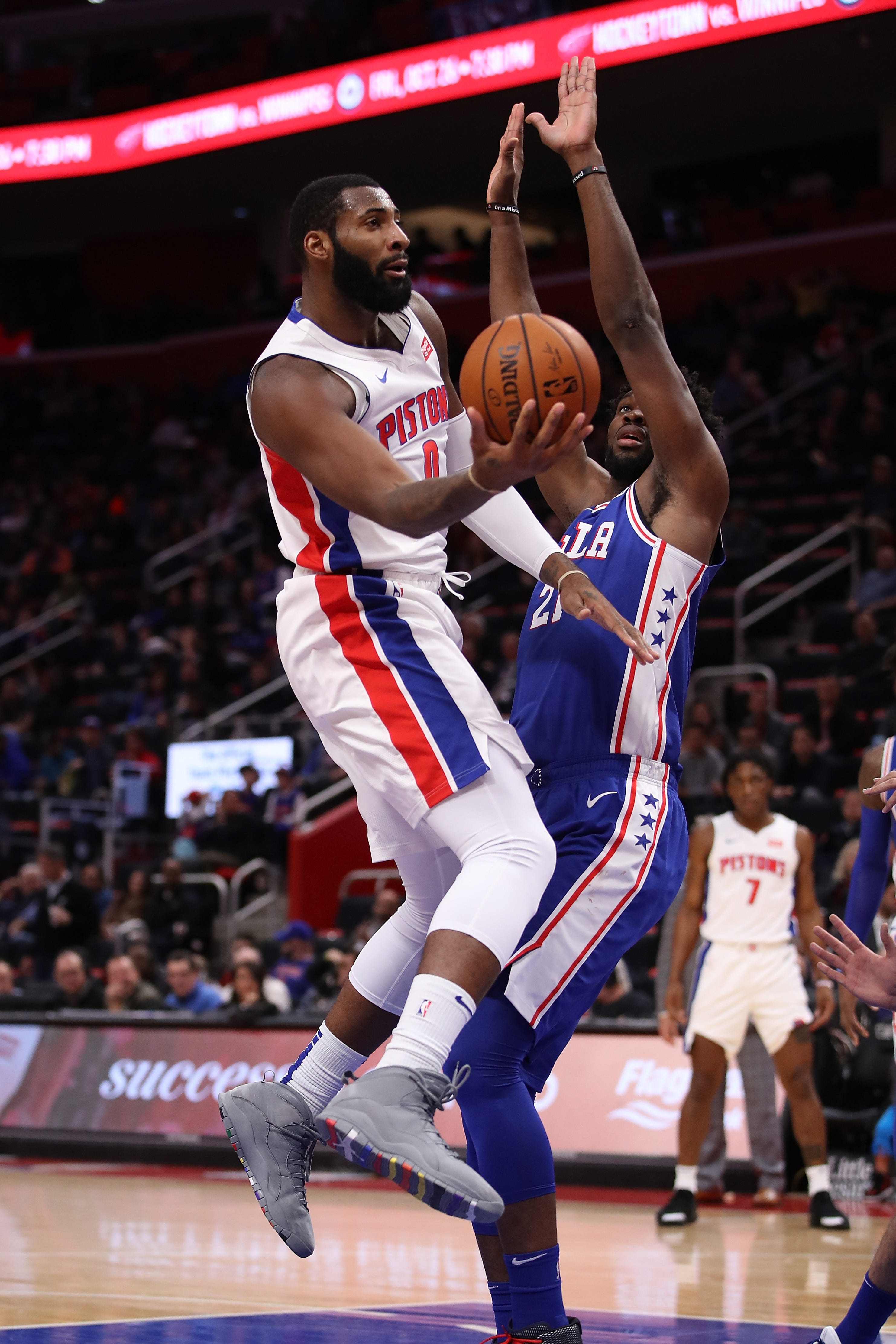 Andre Drummond goes to the basket against Joel Embiid on Tuesday night.