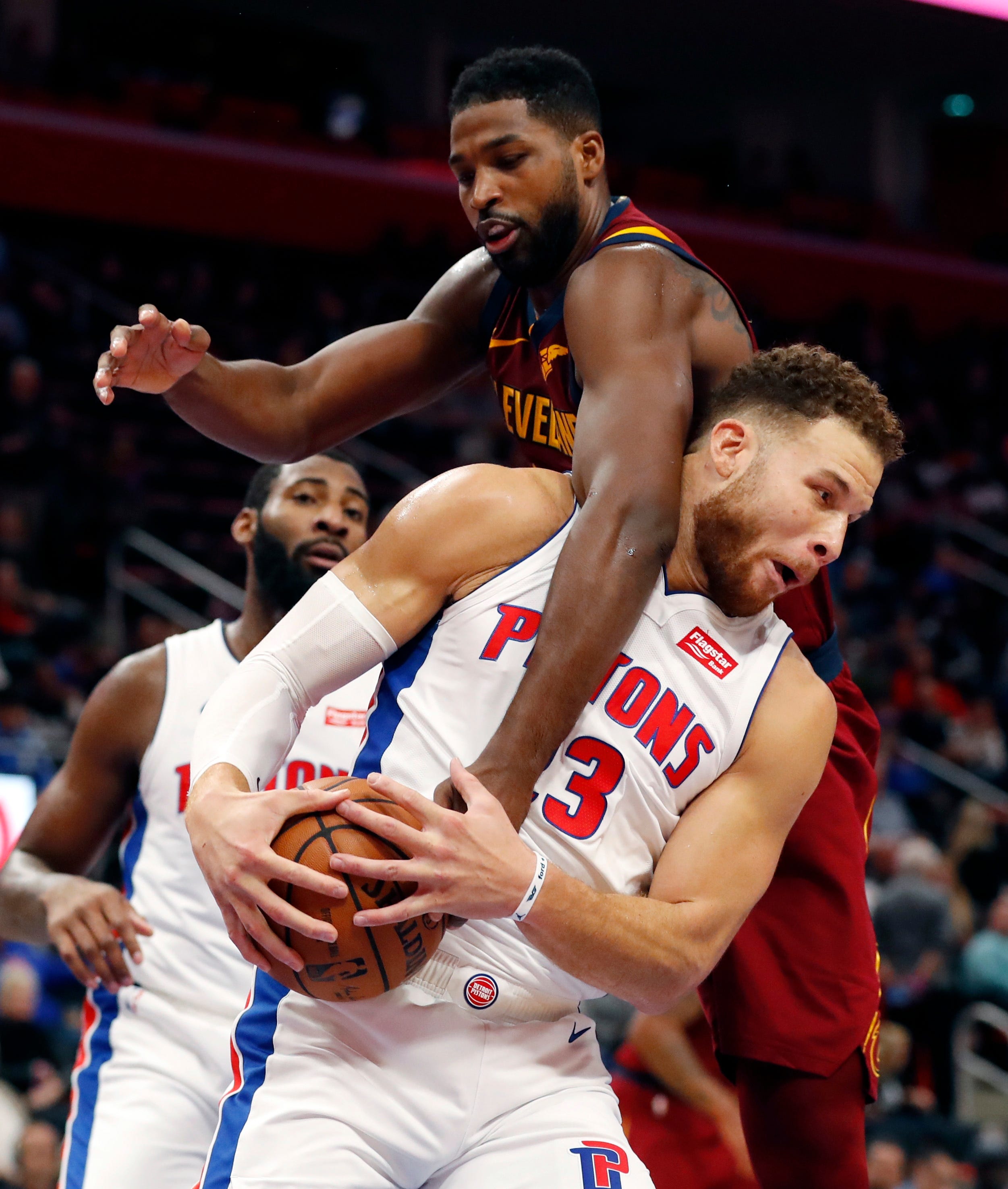 Cleveland Cavaliers center Tristan Thompson reaches in on Detroit Pistons forward Blake Griffin (23) during the second half of an NBA basketball game, Thursday, Oct. 25, 2018, in Detroit. Detroit went on to win 110-103 over Cleveland.