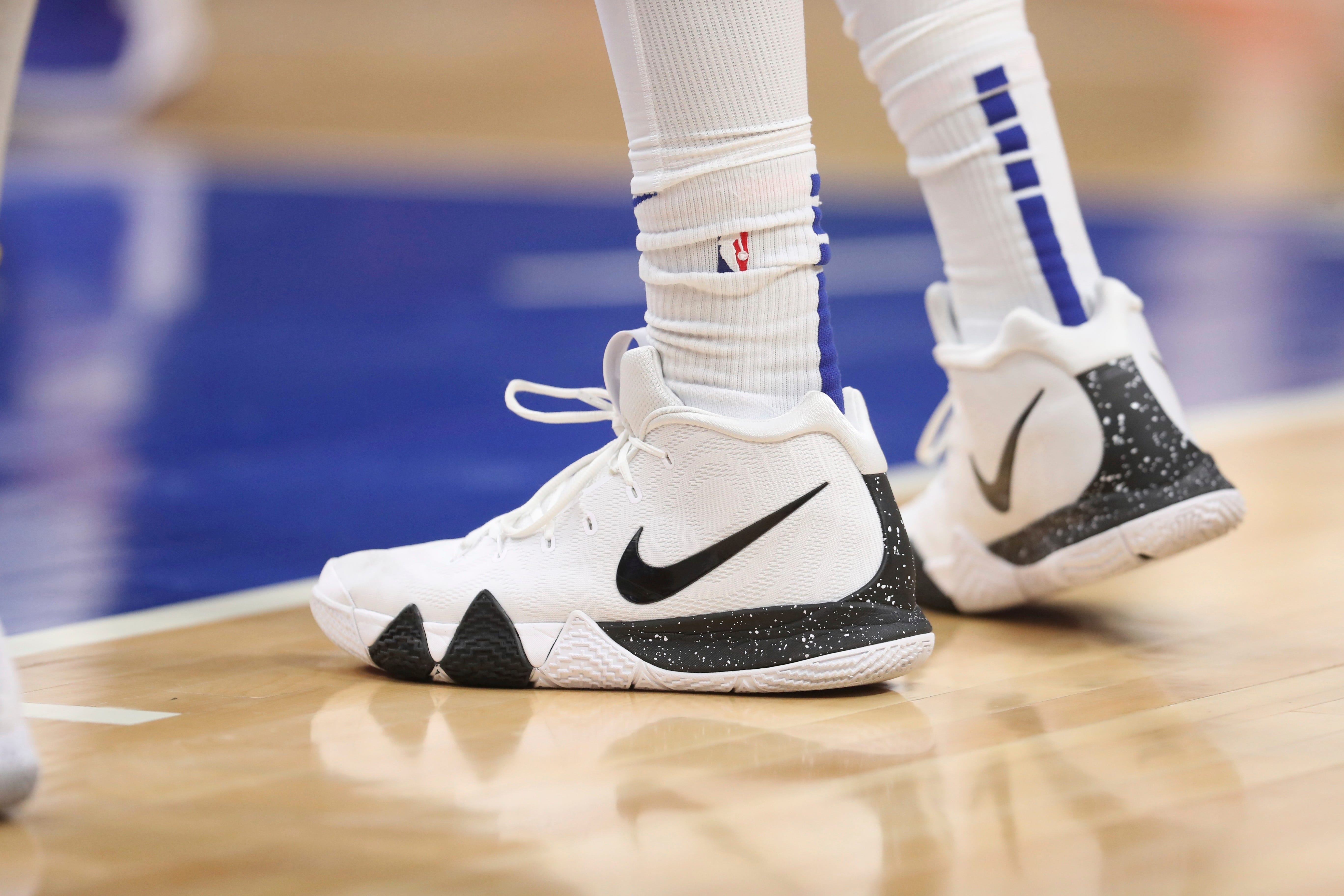 Closeup of Detroit Pistons forward Reggie Bullock ' s shoes during the first half.