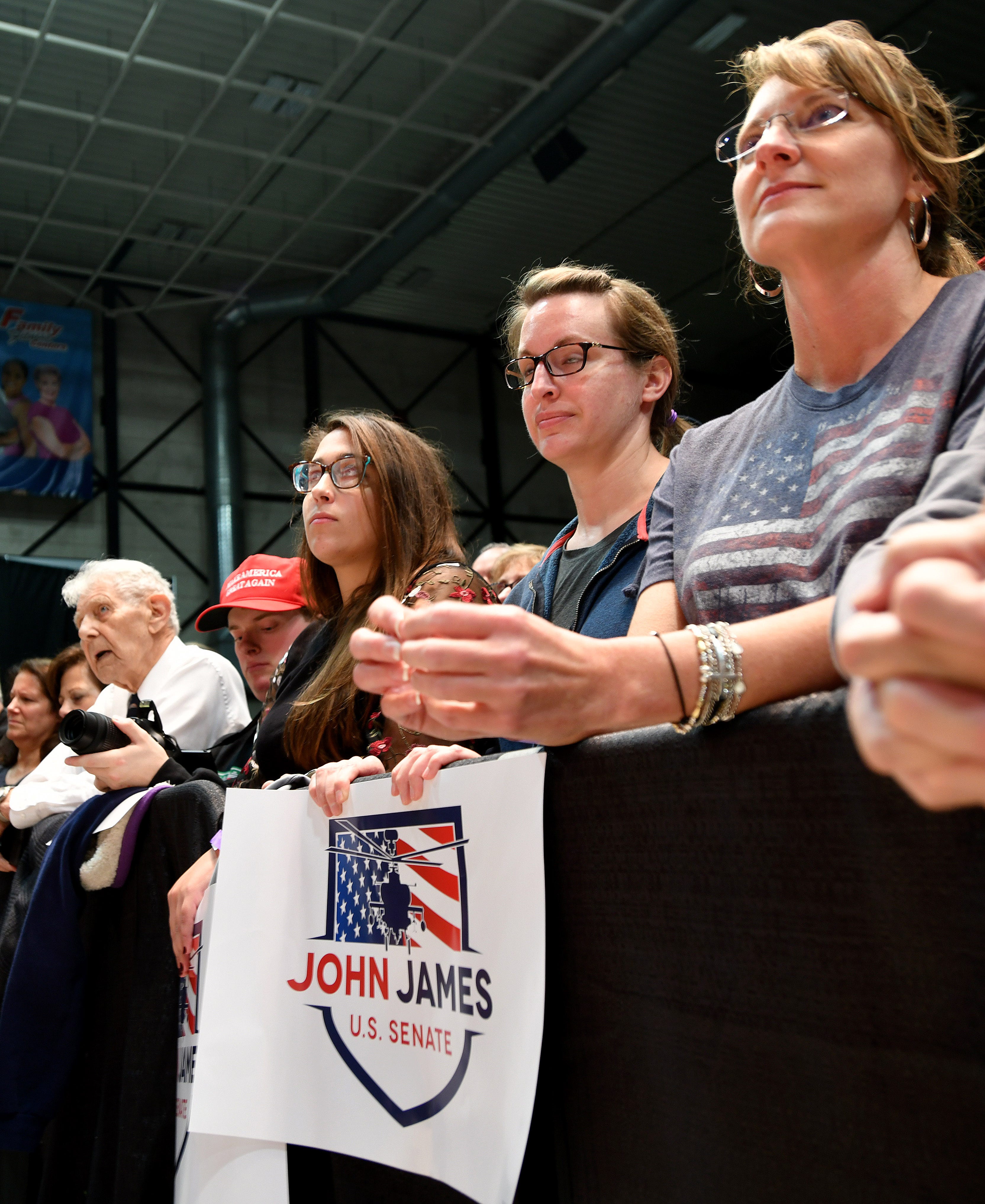 John James supporters line the rail as Vice President Mike Pence campaigns.