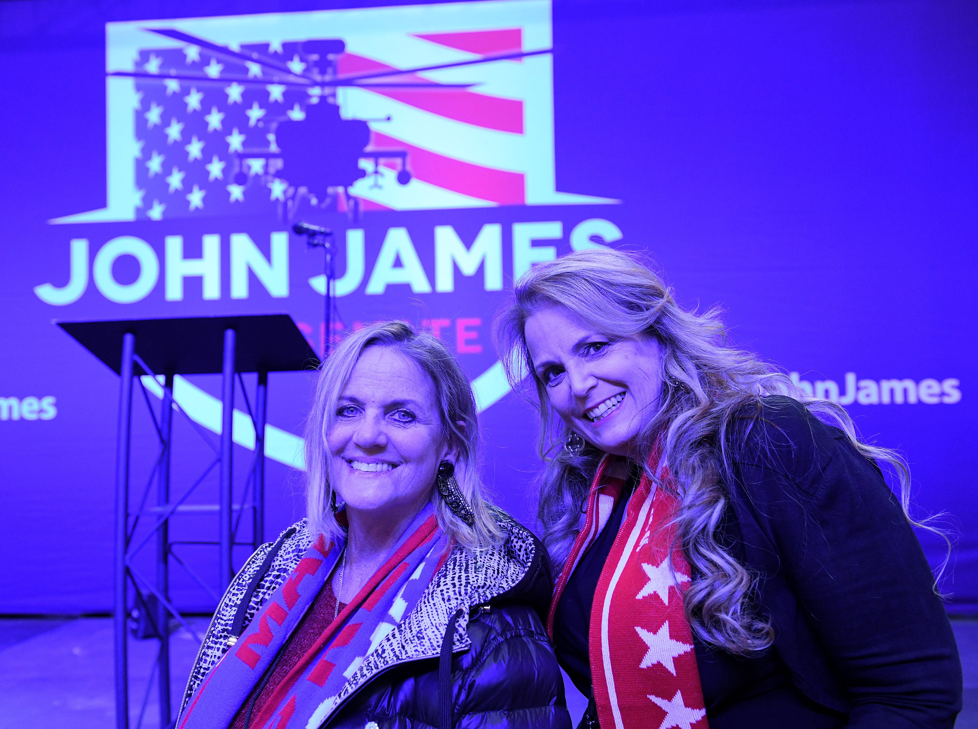 Deborah Richardson of Highland, left, and Vikki Parman of Commerce wait for results to come in at the election night party for U.S. Senate Republican candidate John James in Detroit.