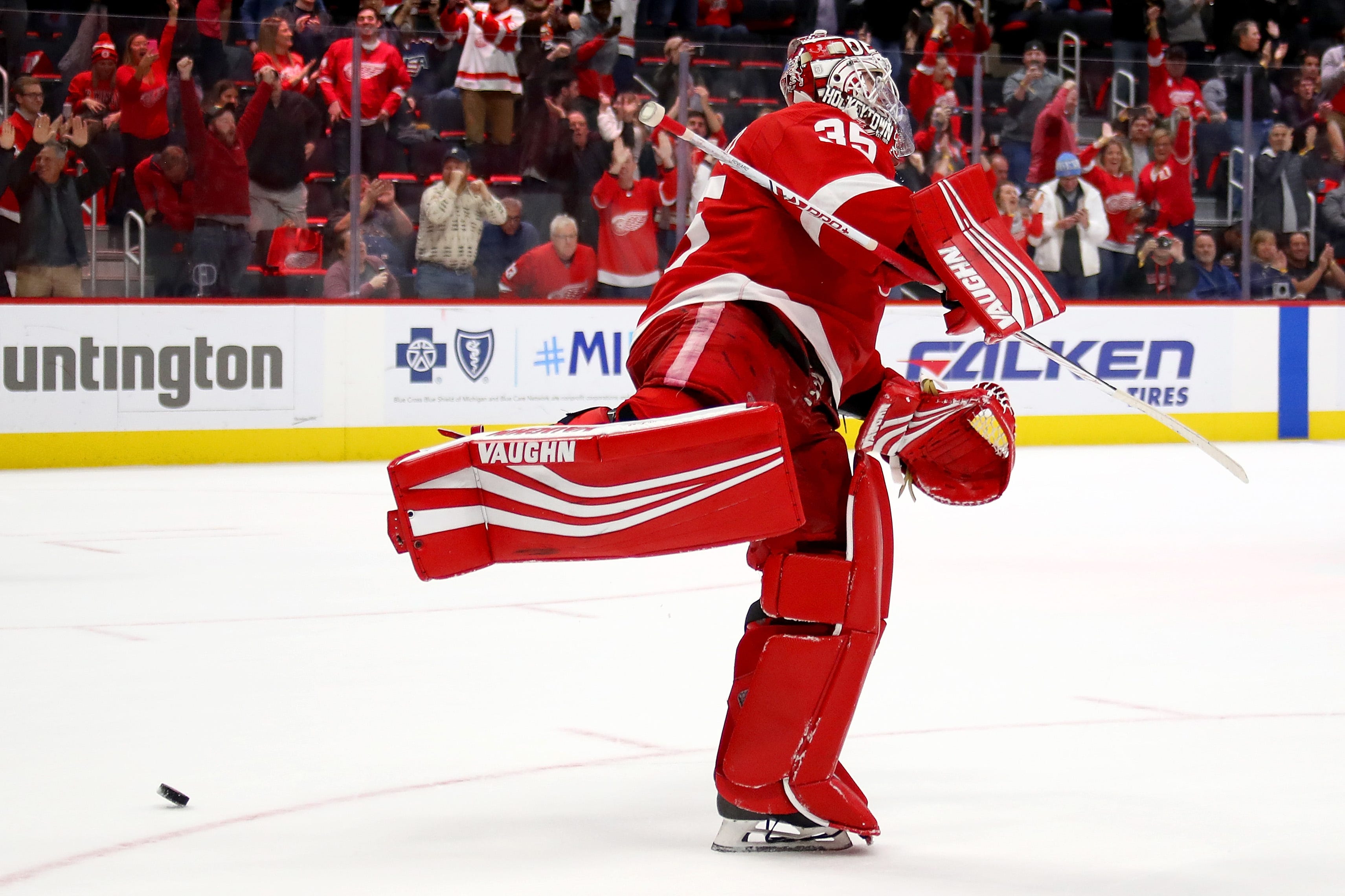 Jimmy Howard of the Detroit Red Wings celebrates a shootout save to beat the Vancouver Canucks.