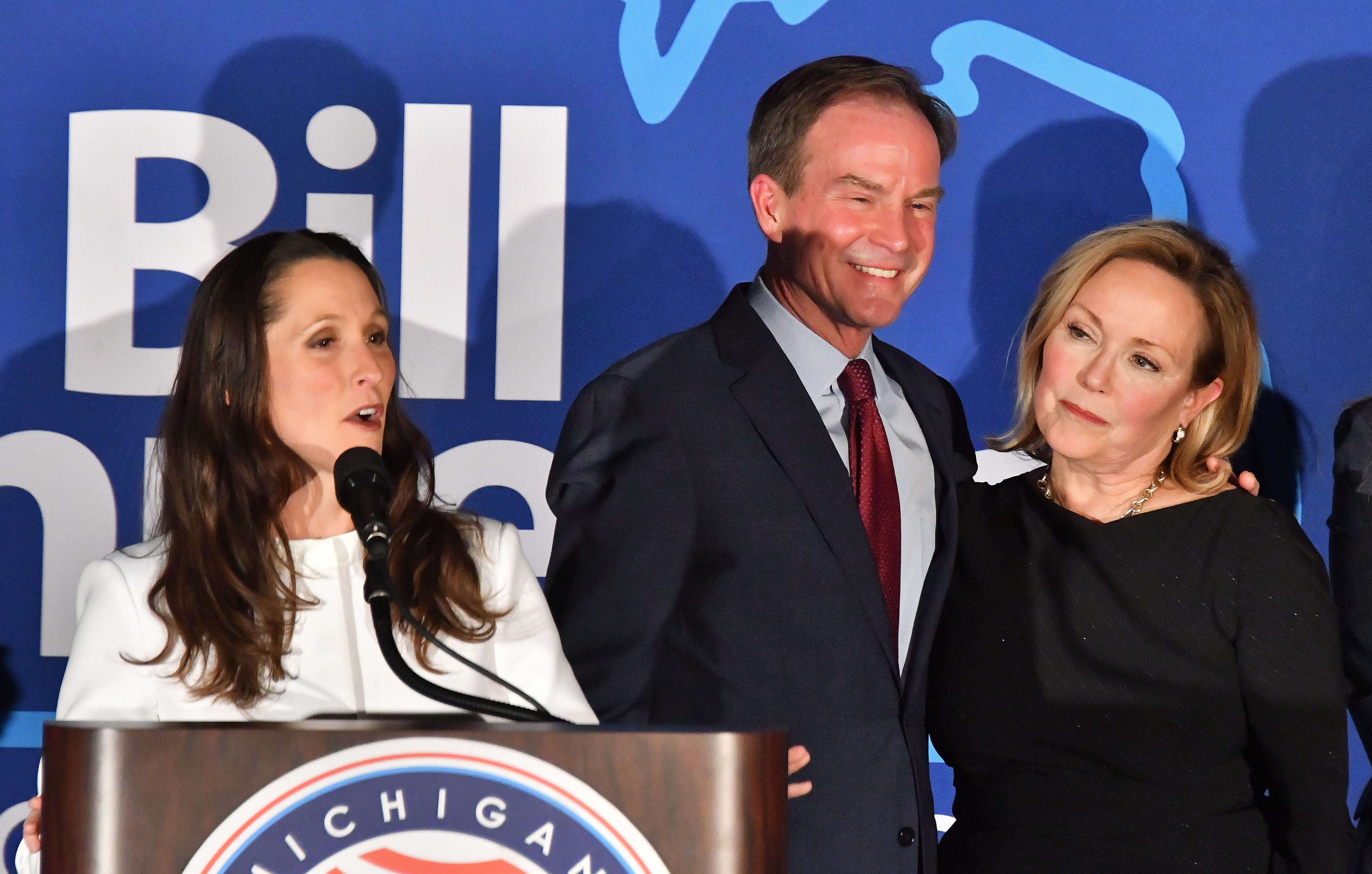 Lt. governor candidate Lisa Posthumus Lyons addresses the crowd beside running mate Bill Schuette and his wife Cynthia as the Michigan GOP gathers at the Lansing Center.
