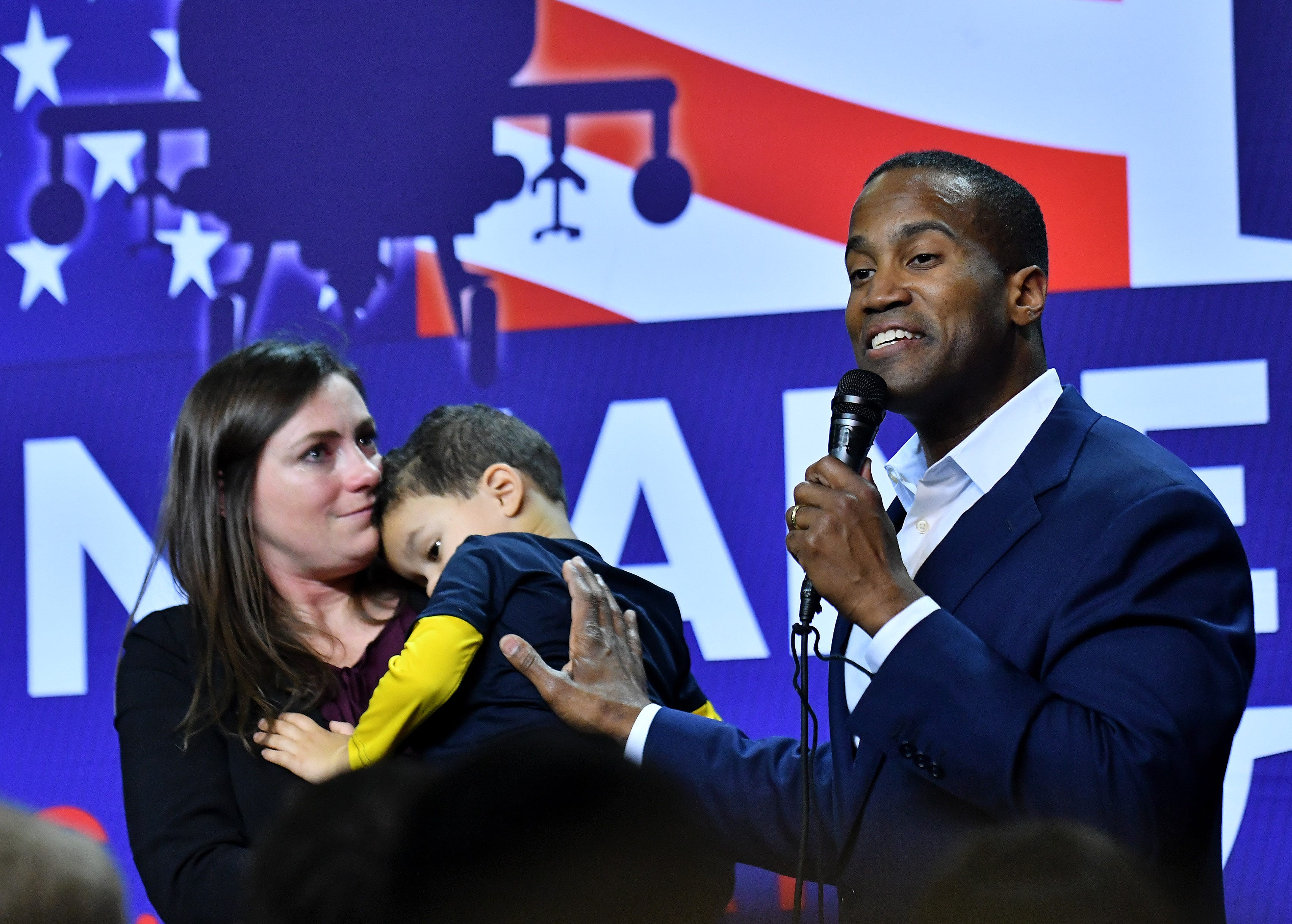 With wife Elizabeth at his side, Republican U.S. Senate candidate John James thanks his supporters, concedes the race and says he will enjoy having more time with his family. He spoke at his election night party  at James Group International in Detroit.