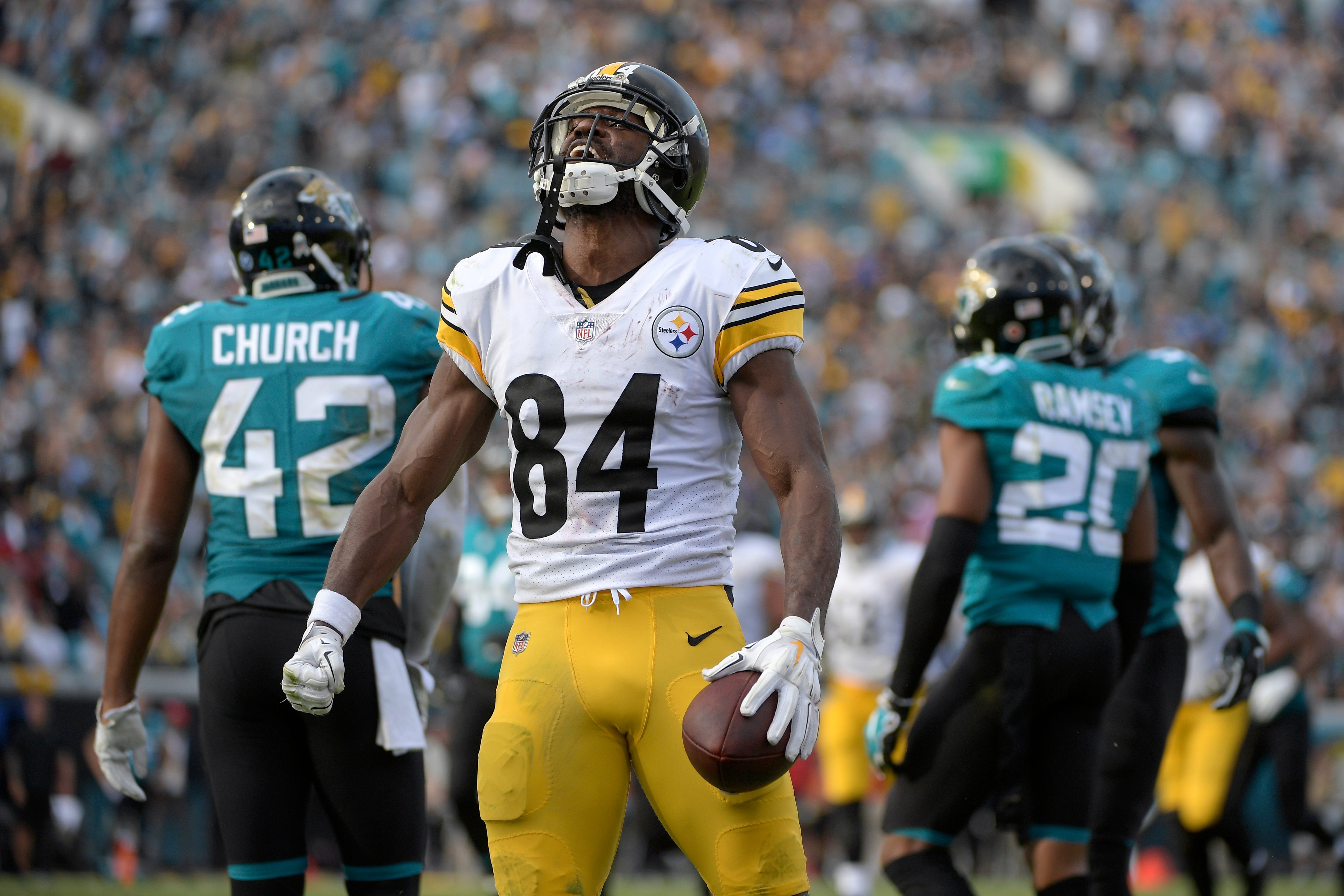 Pittsburgh Steelers wide receiver Antonio Brown (84) reacts after catching a pass in front of Jacksonville Jaguars cornerback Jalen Ramsey (20) for a 25-yard gain during the second half.