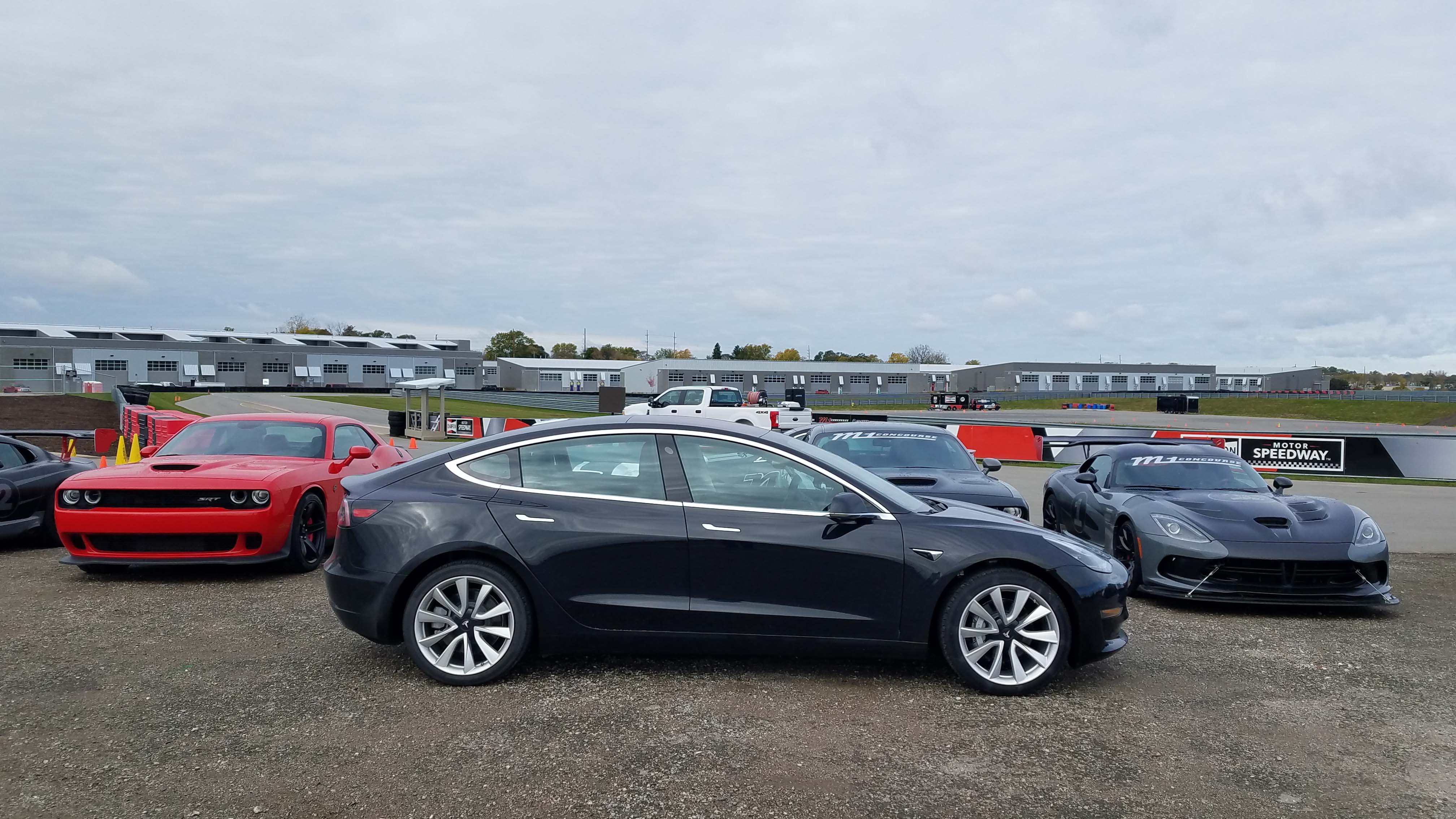 On track at M1 Concourse, the Tesla Model 3 makes no sound. Only the chirp of tires and exterior wind noise invade the cockpit at full flog.