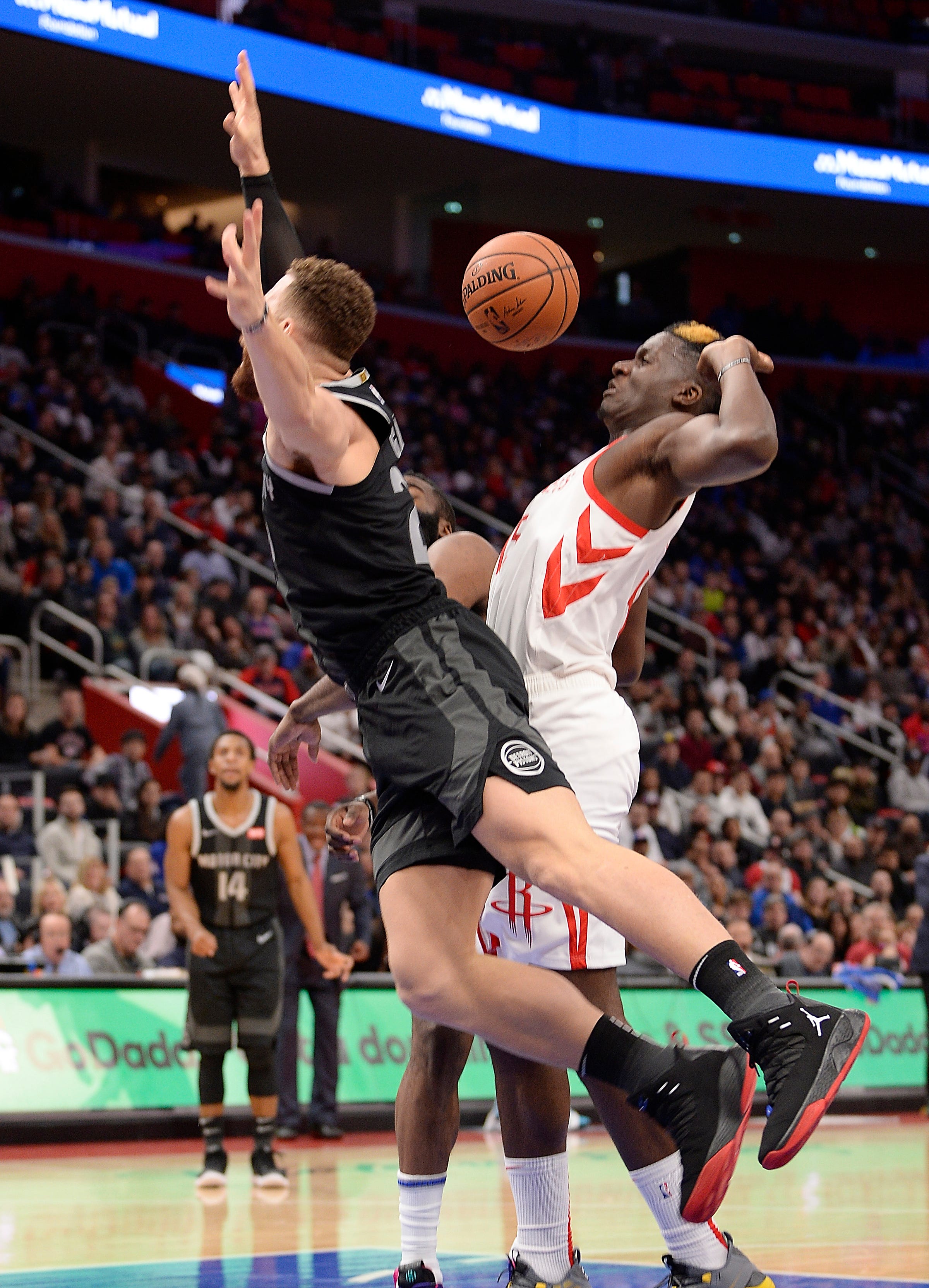 Pistons' Blake Griffin is fouled by Rockets' Clint Capela in the second quarter.
