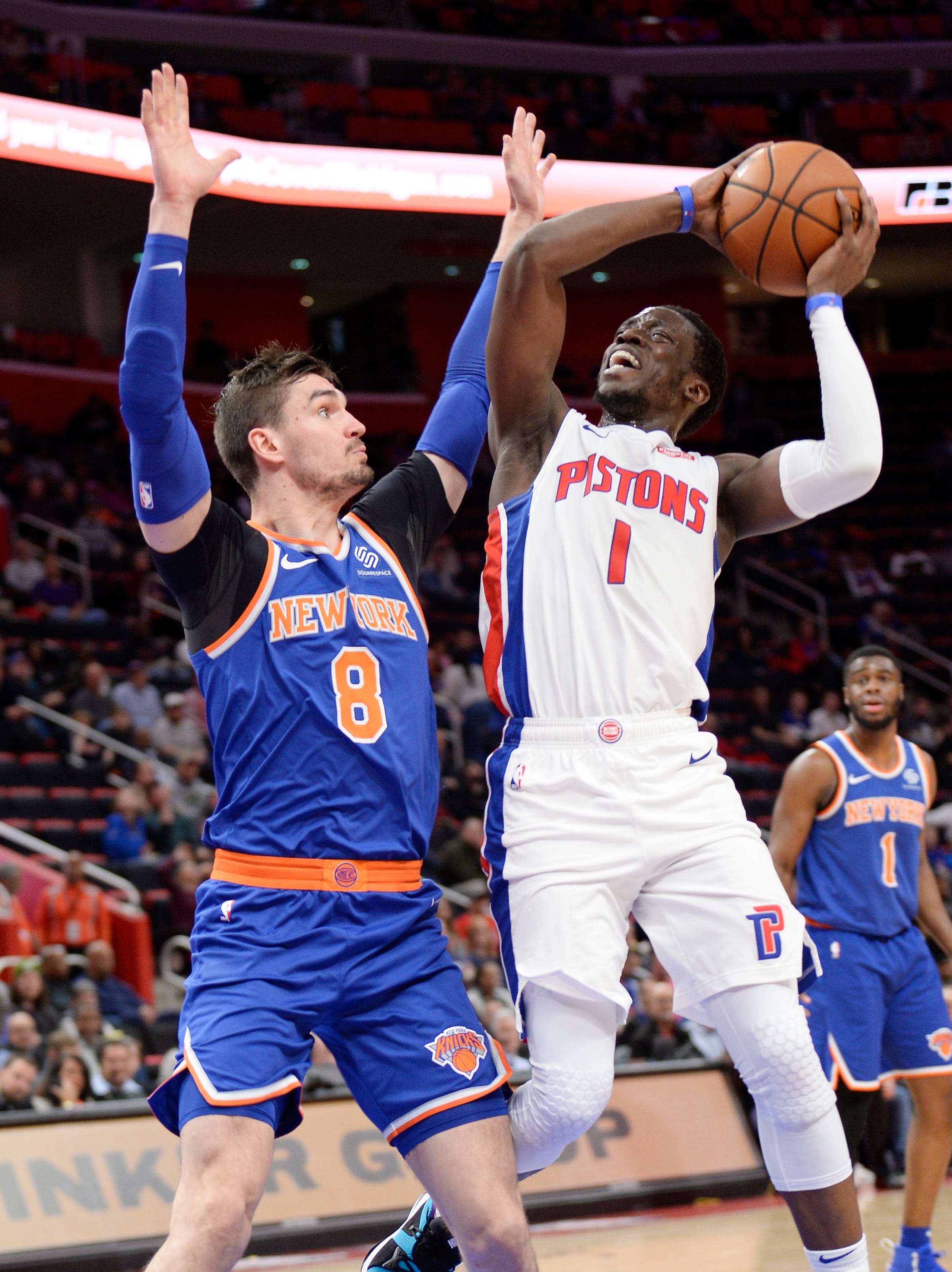 Pistons ' Reggie Jackson shoots over Knicks ' Mario Hezonja in the second quarter. Jackson had 21 points and four assists.