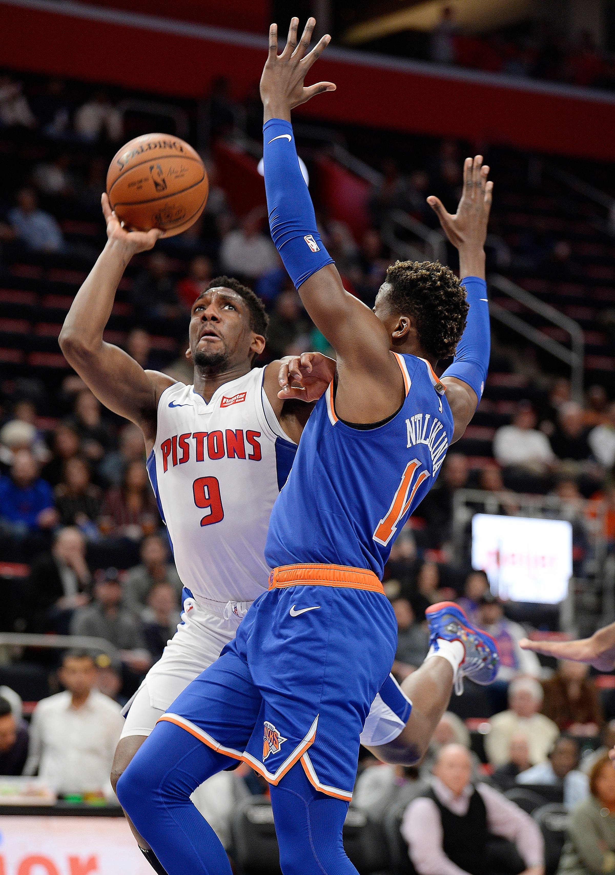 Pistons' Langston Galloway scores over Knicks' Frank Ntilikina in the second quarter.