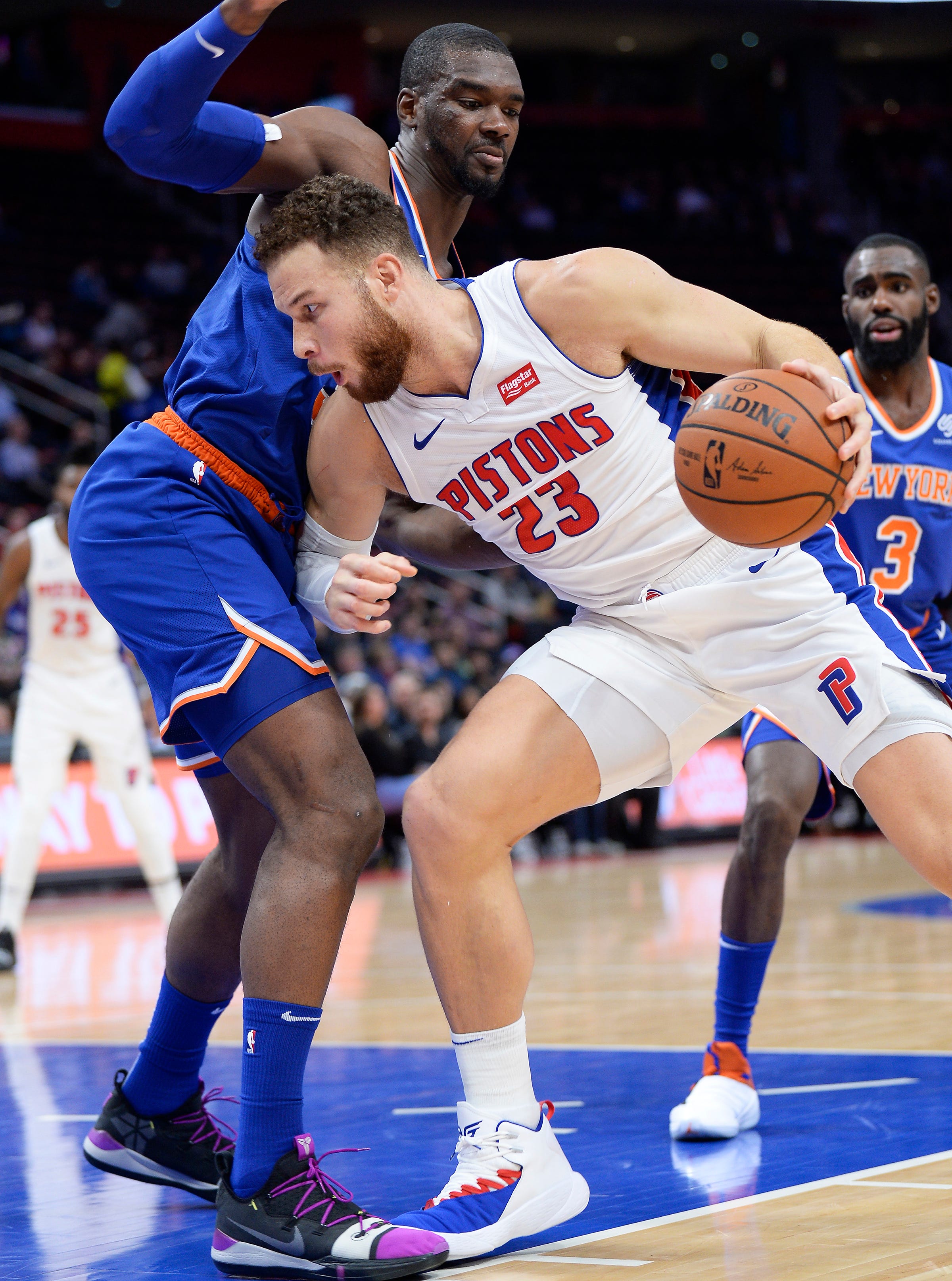 Pistons ' Blake Griffin drives around Knicks ' Noah Vonleh in the first quarter. Griffin had a game-high 30 points and four rebounds.