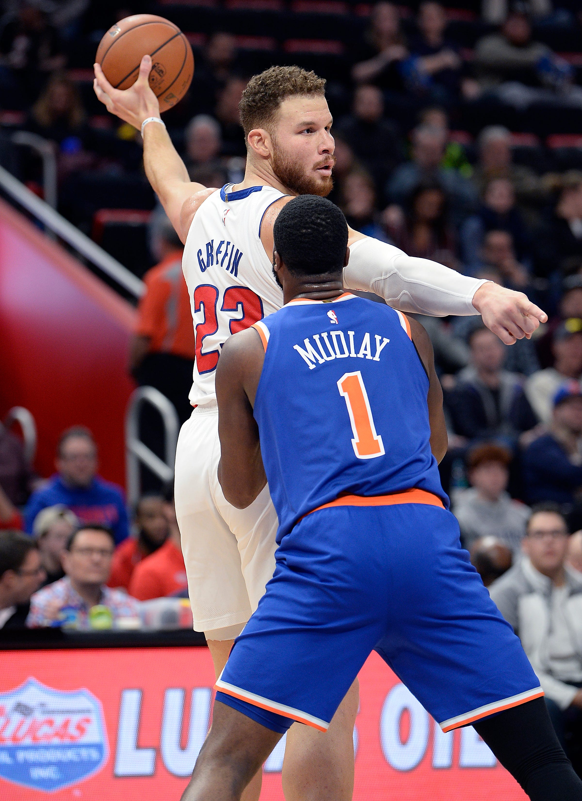 Pistons' Blake Griffin directs traffic over Knicks' Emmanuel Mudiay in the second quarter.