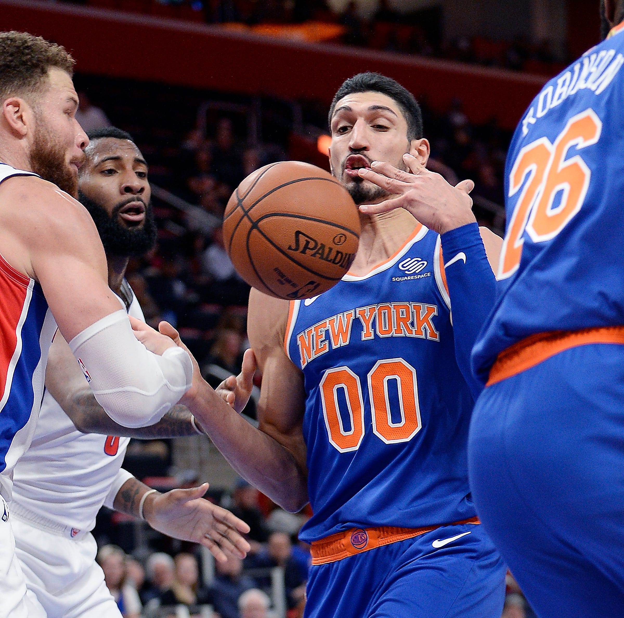 Pistons ' Blake Griffin, left; and Andre Drummond battle with Knicks ' Enes Kanter in the third quarter.