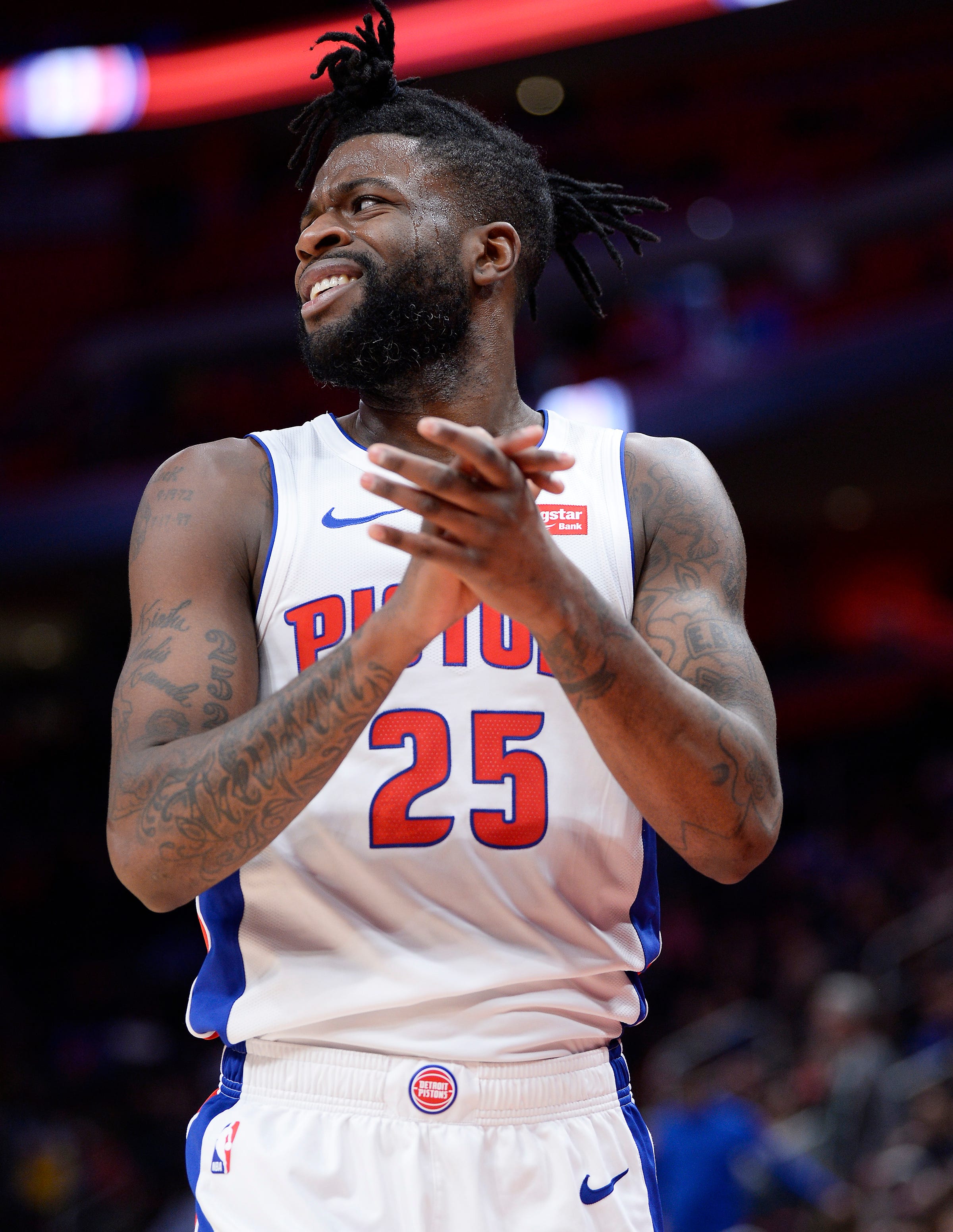 Pistons' Reggie Bullock reacts to a foul called on him in the fourth quarter.