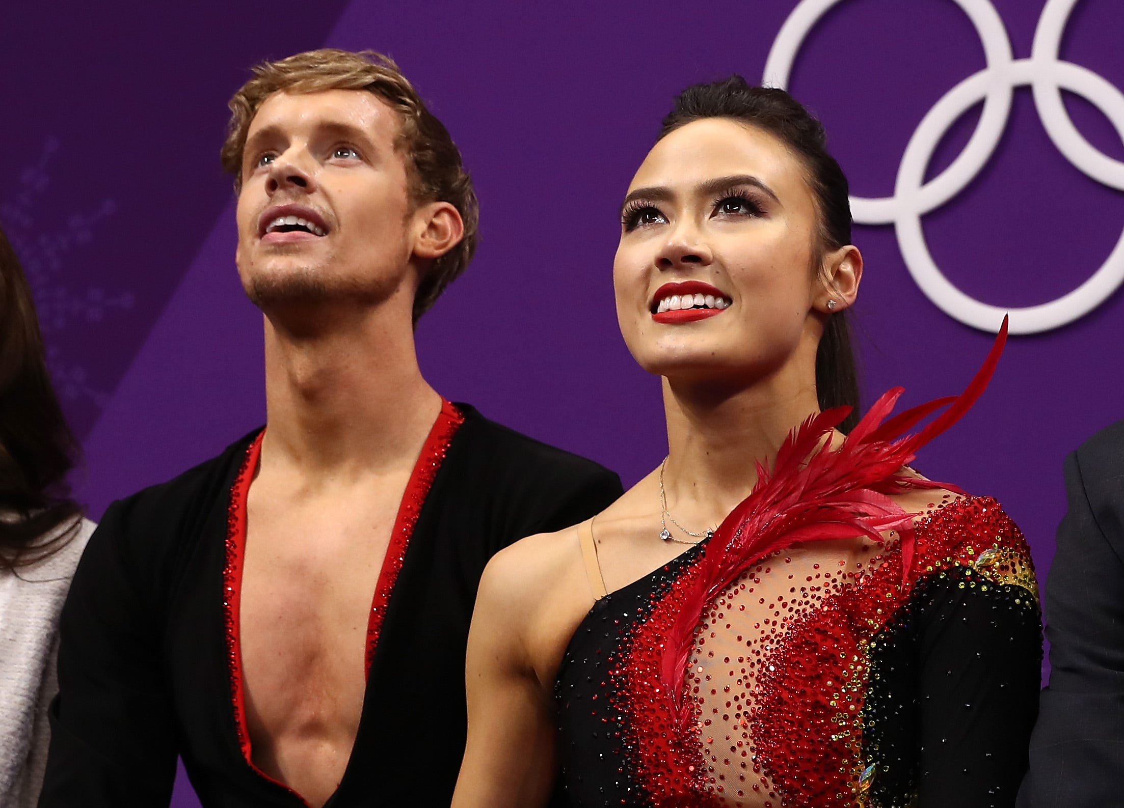 Novi's Madison Chock, right, and Northville's Evan Bates wait for their marks after the ice dance short program at the PyeongChang 2018 Winter Olympic Games.