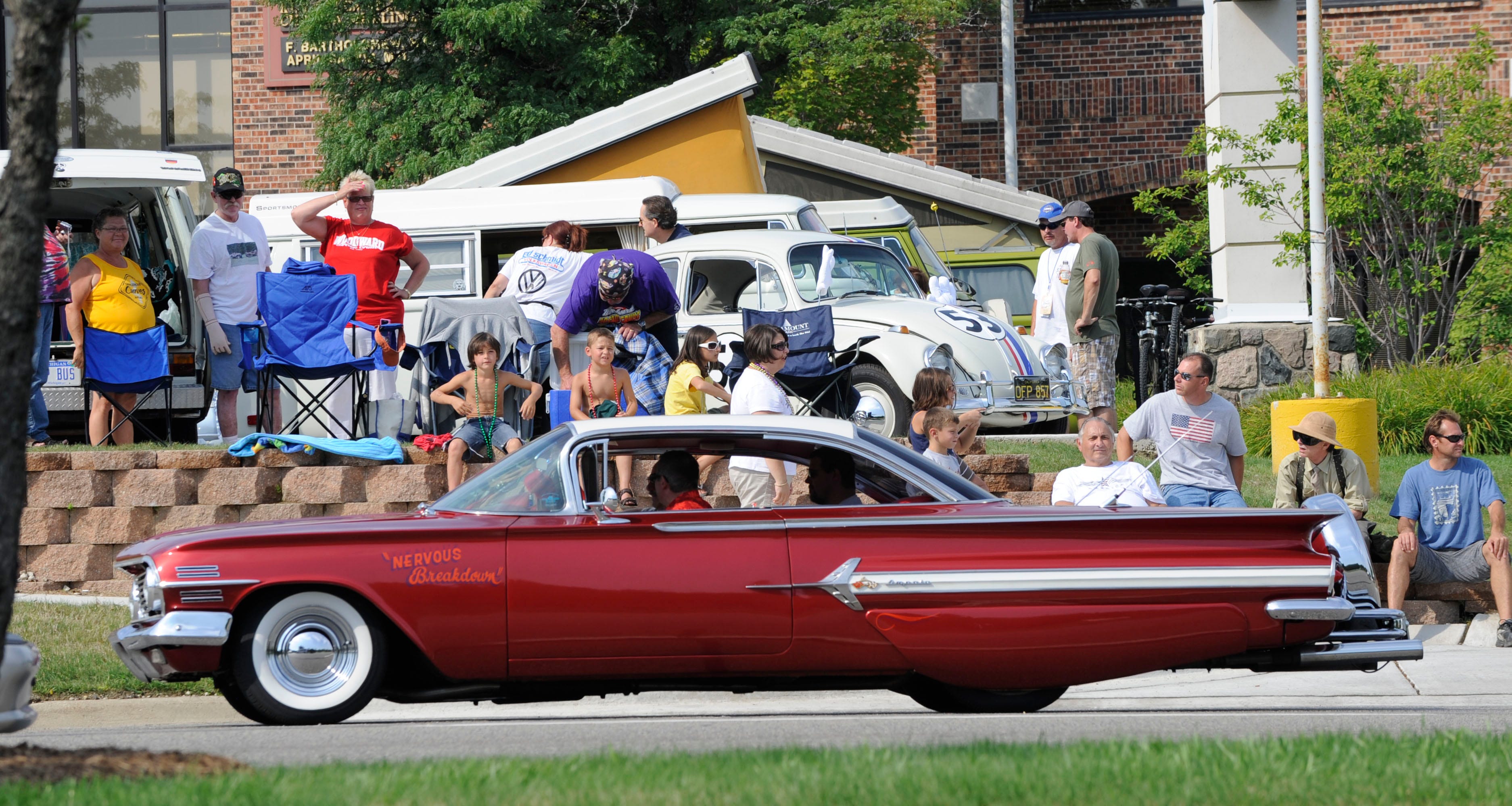 This 1960 Chevrolet Impala Super Sports makes its way down Woodward in Bloomfield Hills.