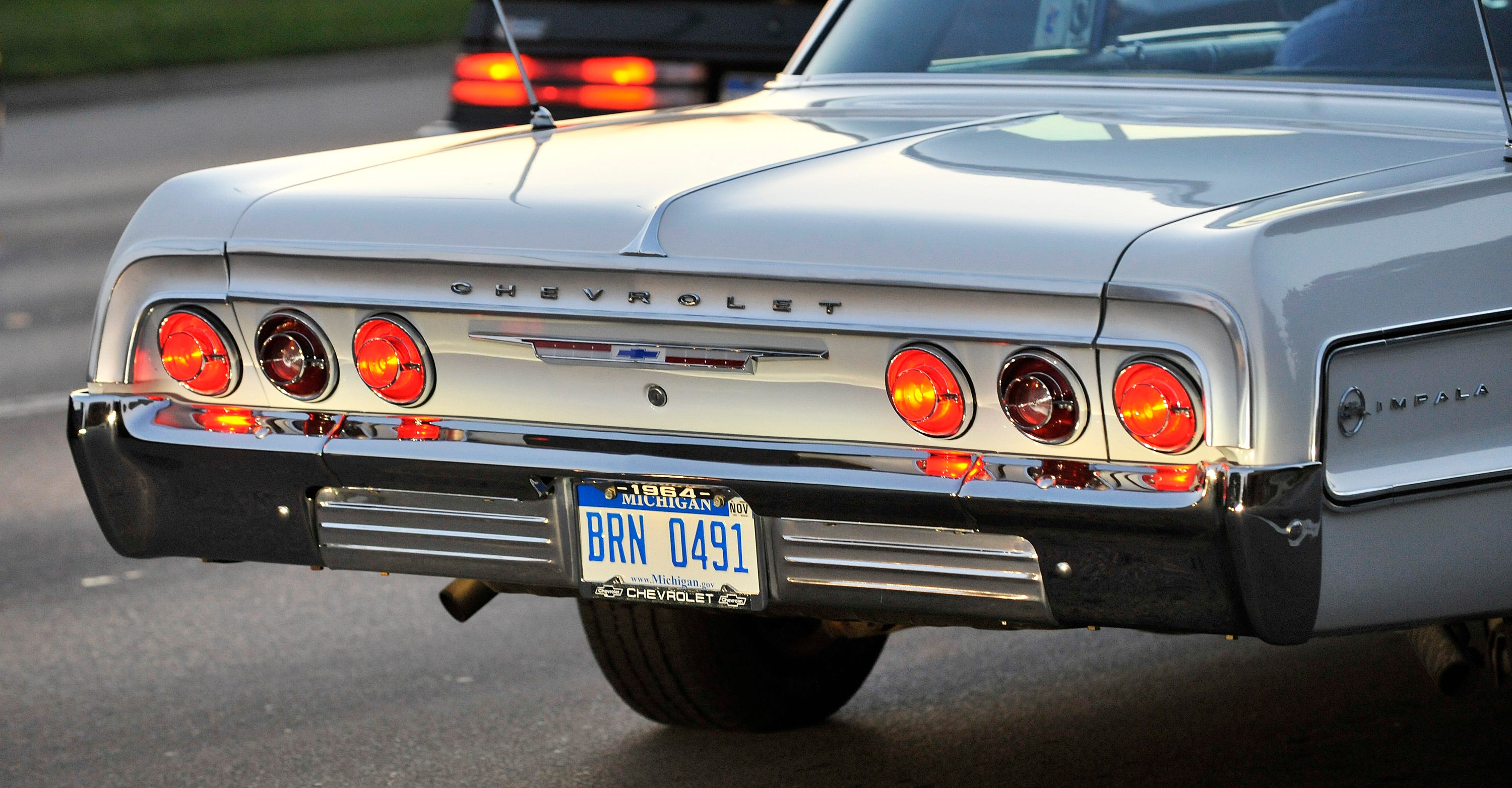 The taillights of a 1964 Chevrolet Impala on Woodward during the Dream Cruise, Aug. 14, 2009.
