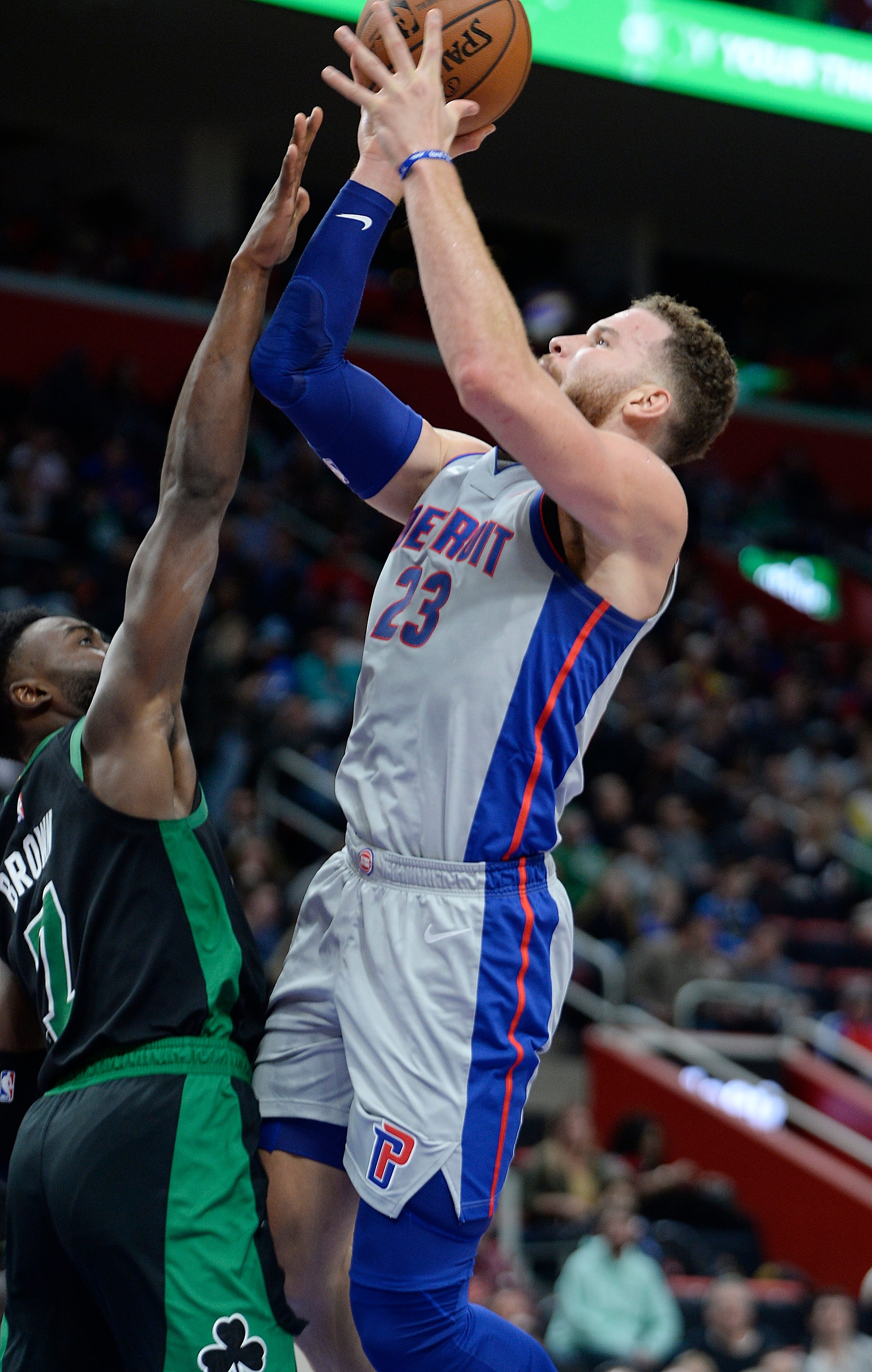 Pistons' Blake Griffin shoots over Celtics' Jaylen Brown in the third quarter.