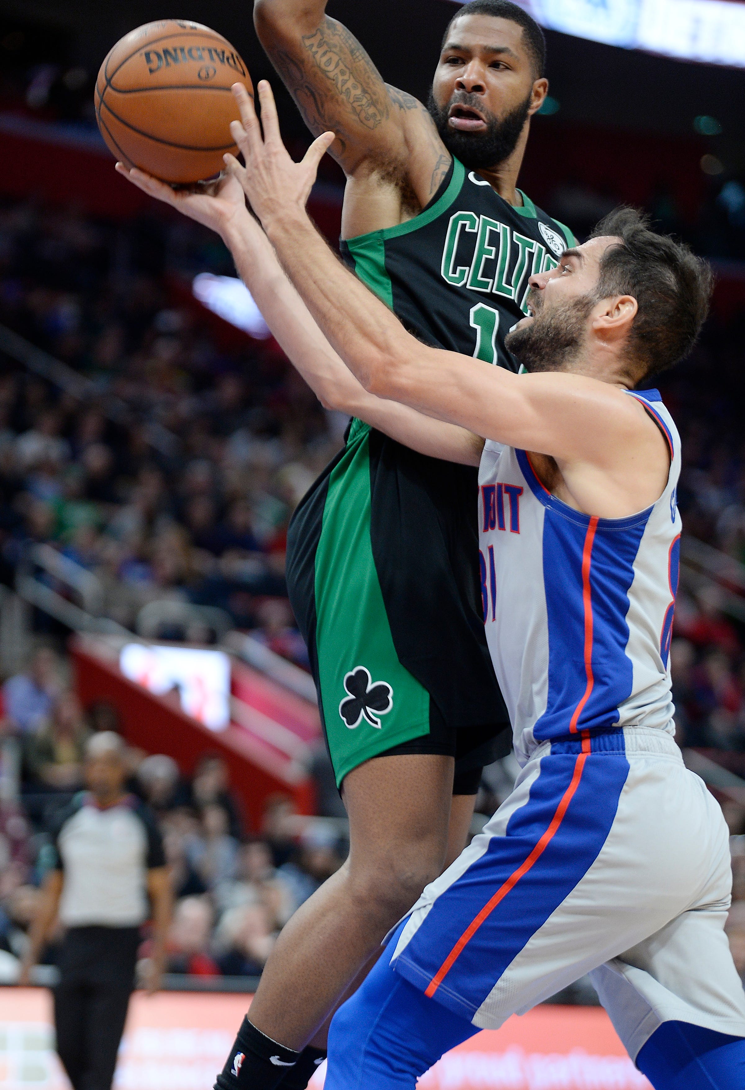 Pistons' Jose Calderon shoots over Celtics' Marcus Morris in the third quarter.