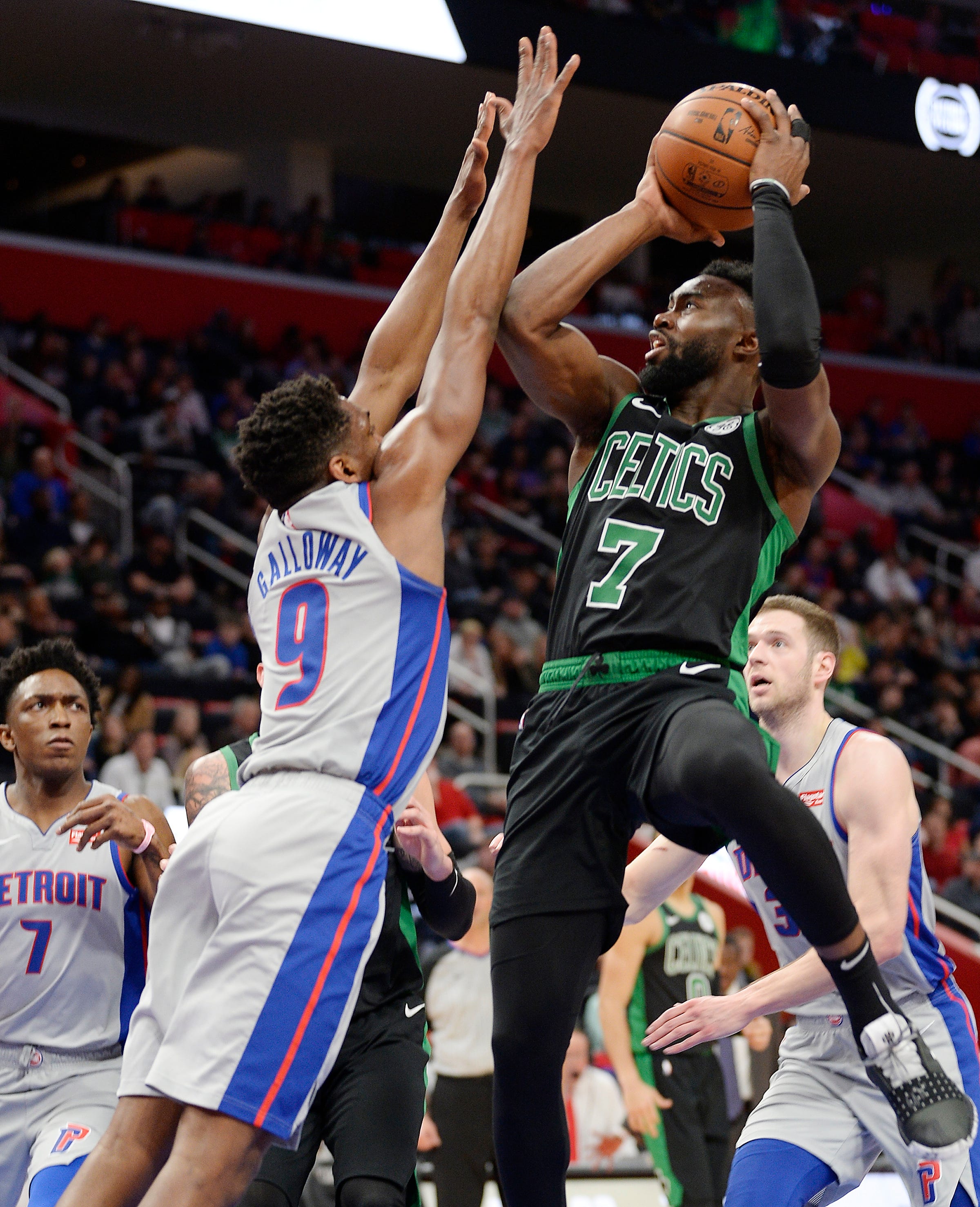Celtics ' Jaylen Brown shoots over Pistons ' Langston Galloway in the second quarter.