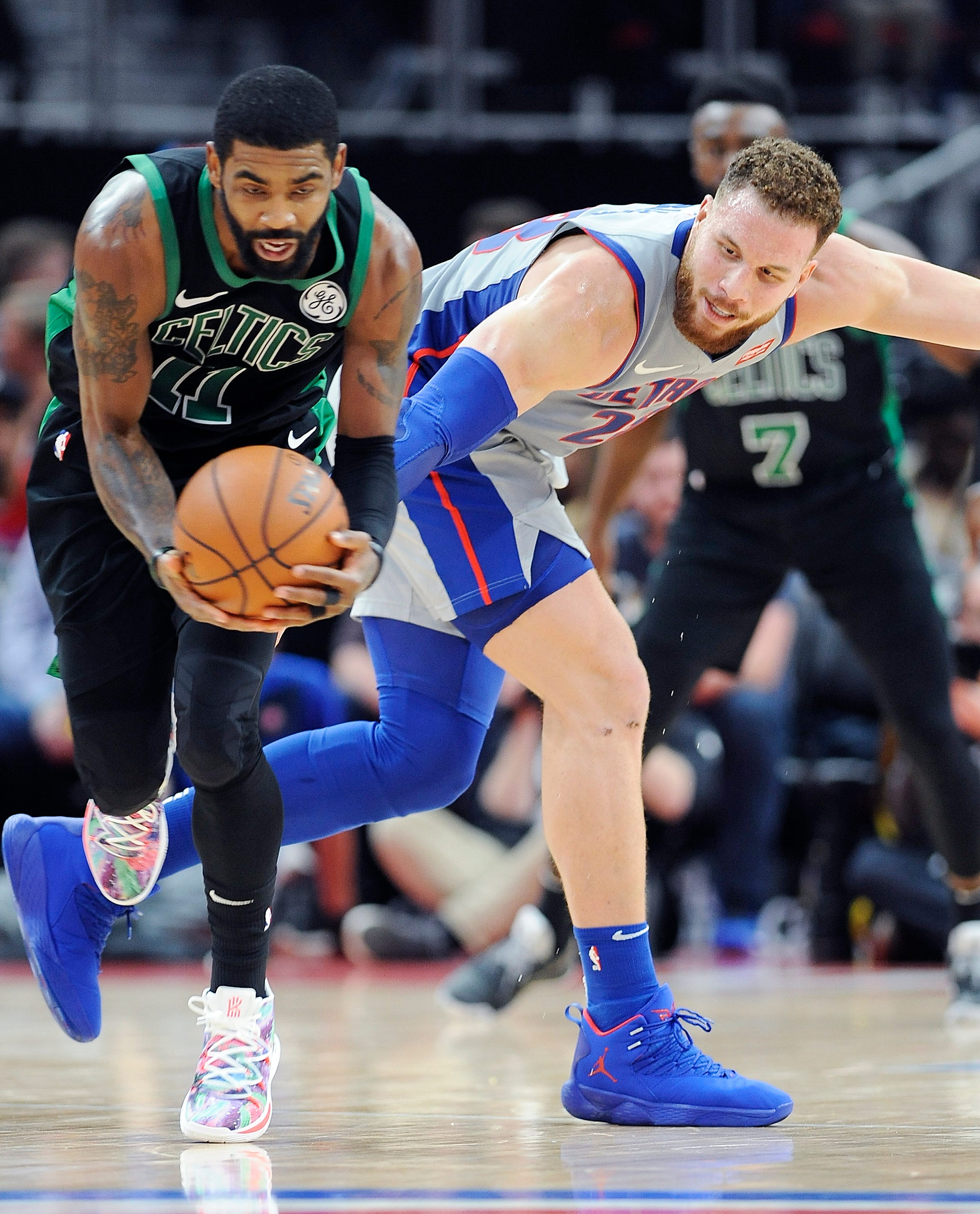 Celtics' Kyrie Irving steals the ball from Pistons' Blake Griffin in the second quarter.