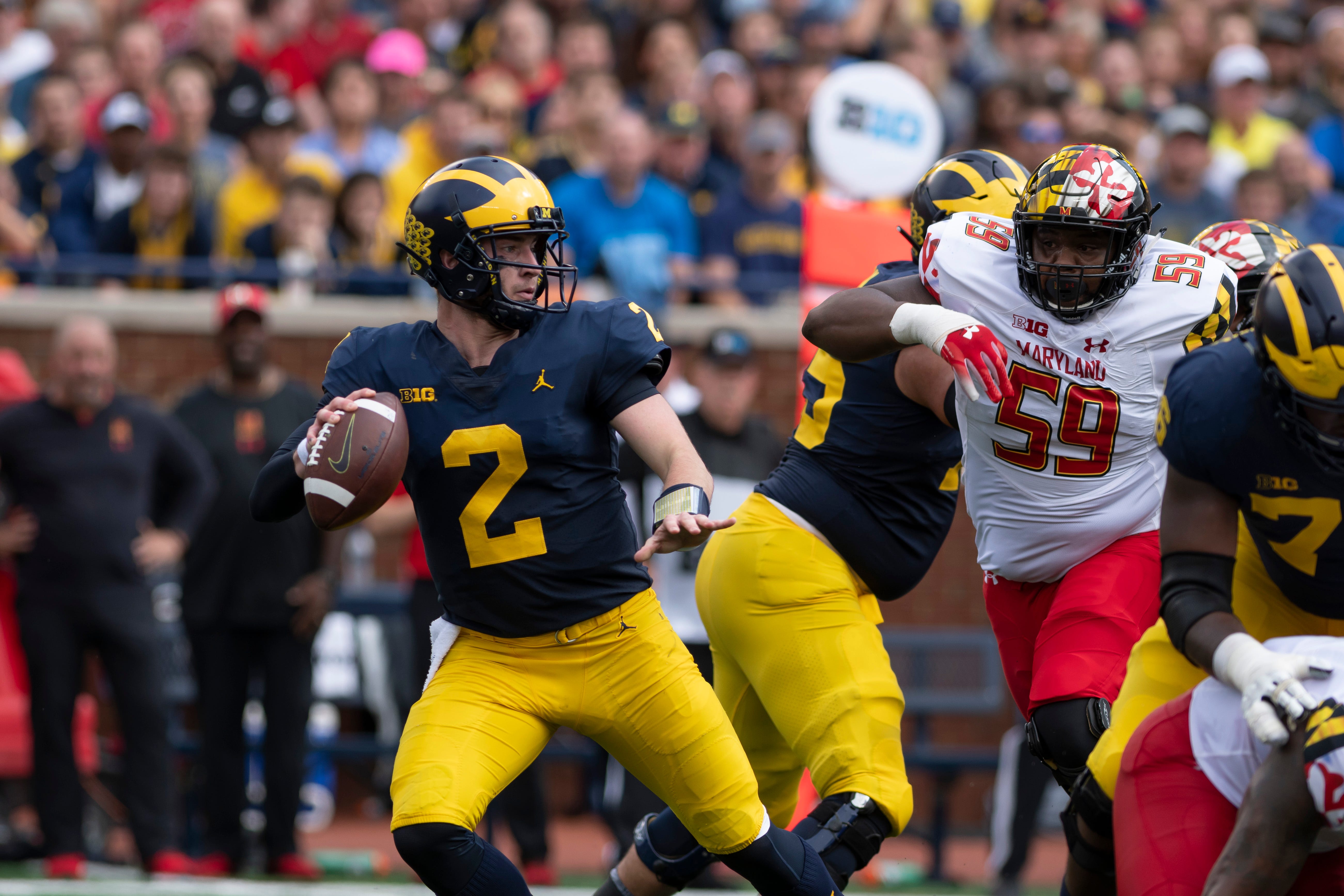 Michigan quarterback Shea Patterson looks for an open man against Maryland.