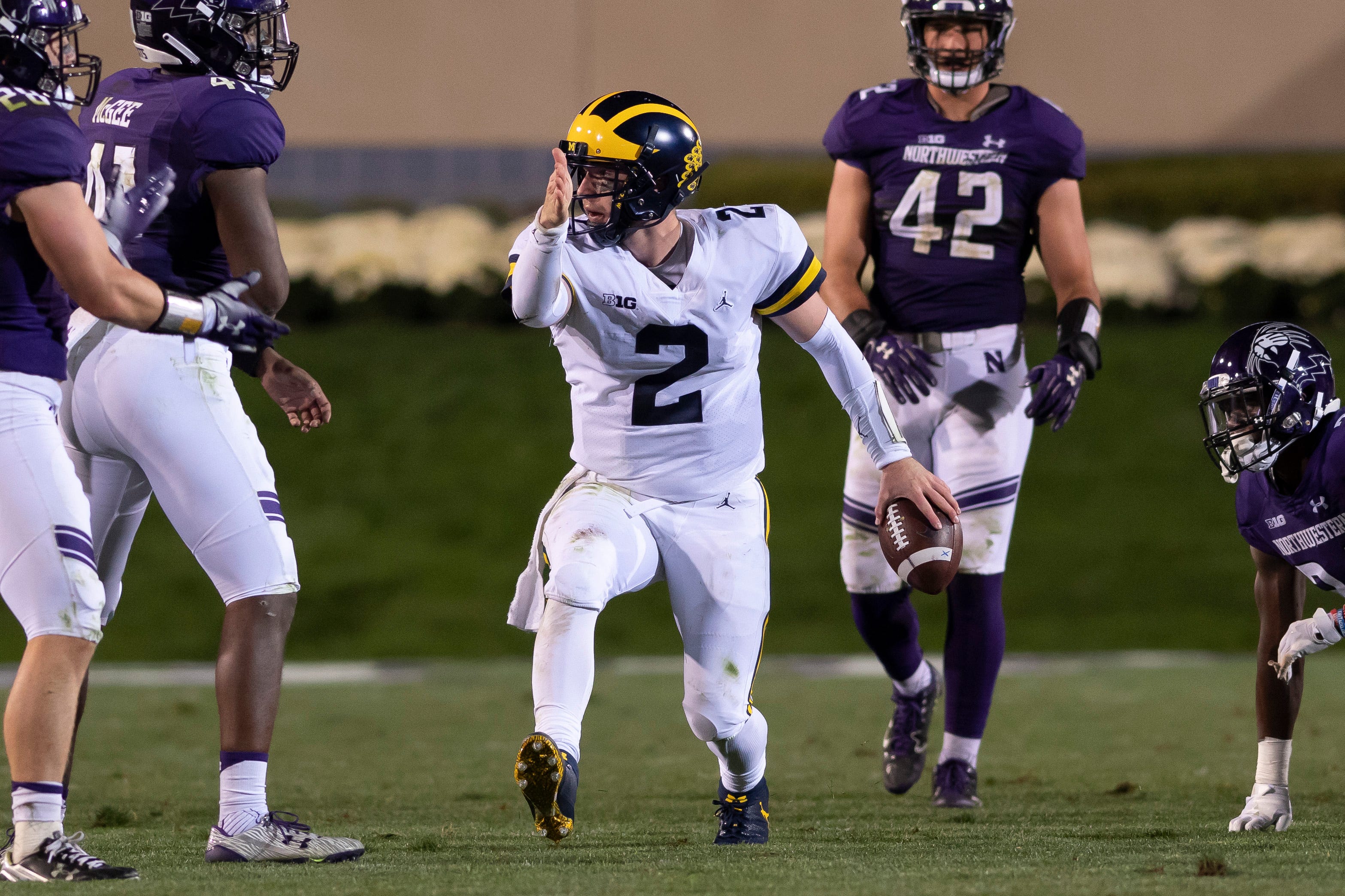 Michigan quarterback Shea Patterson signals after running for a first down in the fourth quarter against Northwestern.