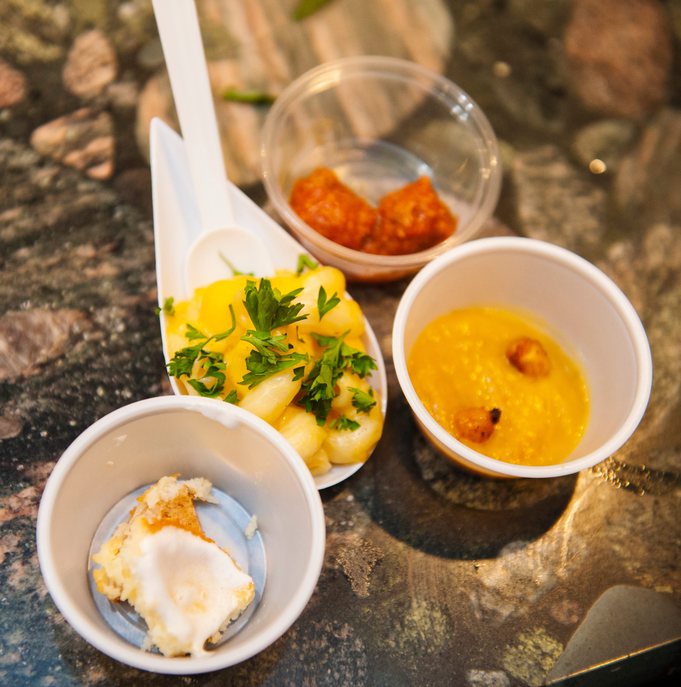 Free cannabis-infused food samples include, from left, cheesecake, macaroni and cheese, meatballs and butternut squash soup with roasted chipotle chick peas.