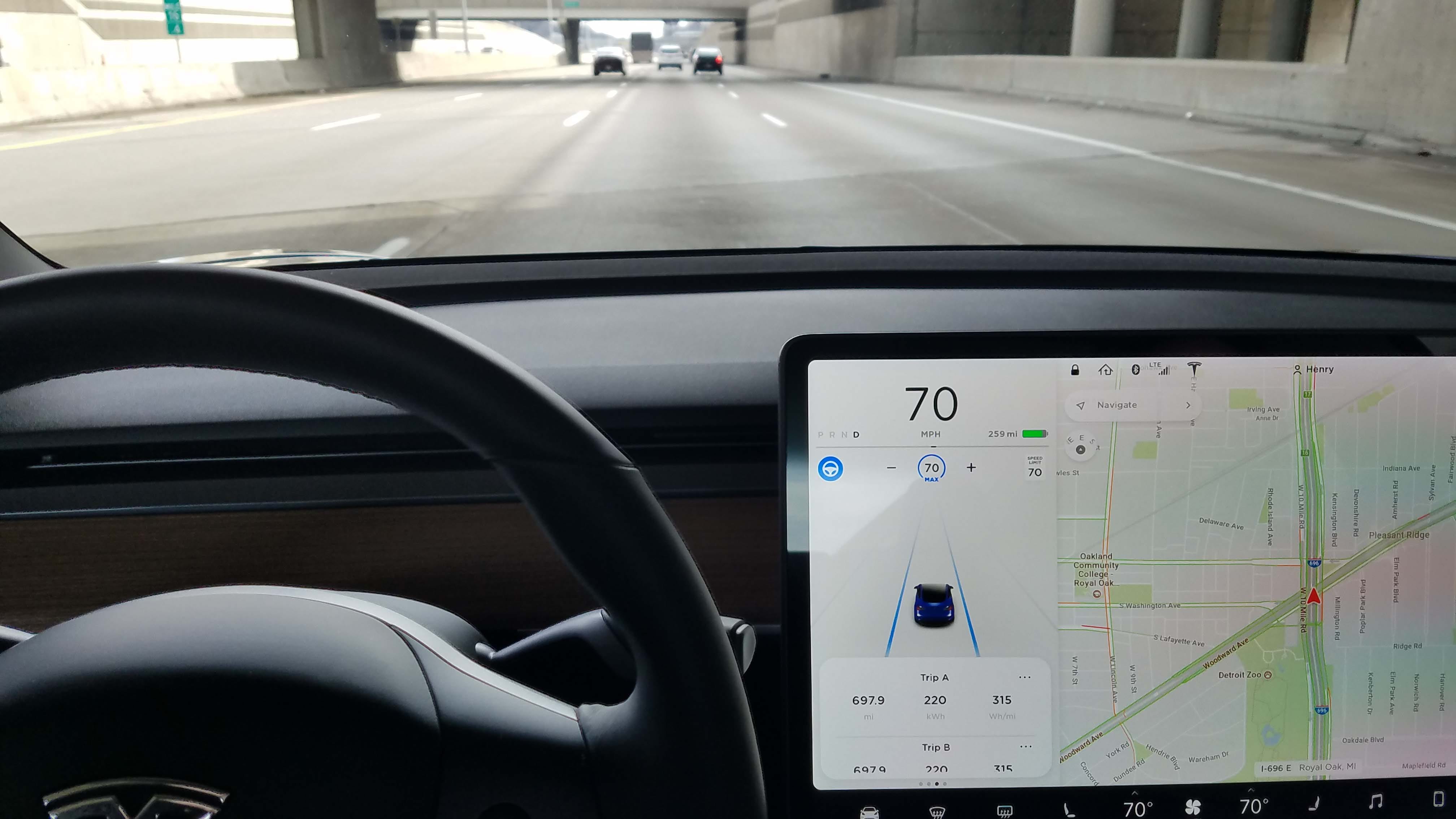 Self-driving Auto Pilot comes as an option of the Tesla Model 3. Push the steering wheel button on the northwest corner of the display, it turns blue, and the car takes over.