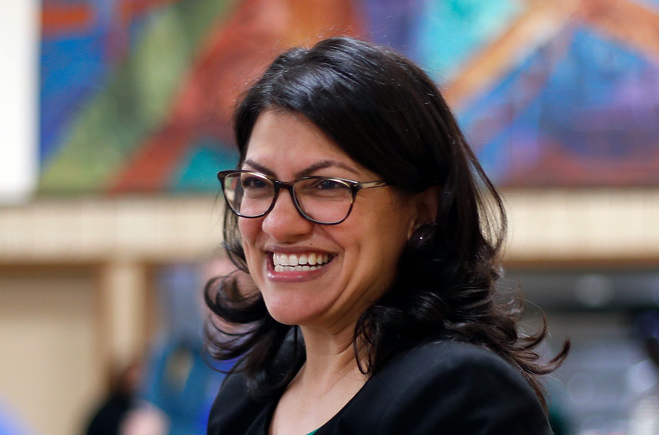 Newly sworn-in Rep. Rashida Tlaib of Detroit told a cheering crowd that “we’re going to ... impeach the (expletive),” referring to President Donald Trump.