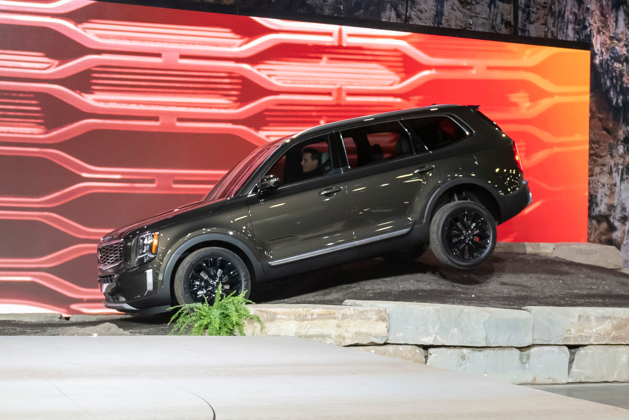 The 2020 Kia Telluride is driven on an off-road road course during its reveal at the North American International Auto Show at Cobo Center in Detroit, Jan. 14, 2019.