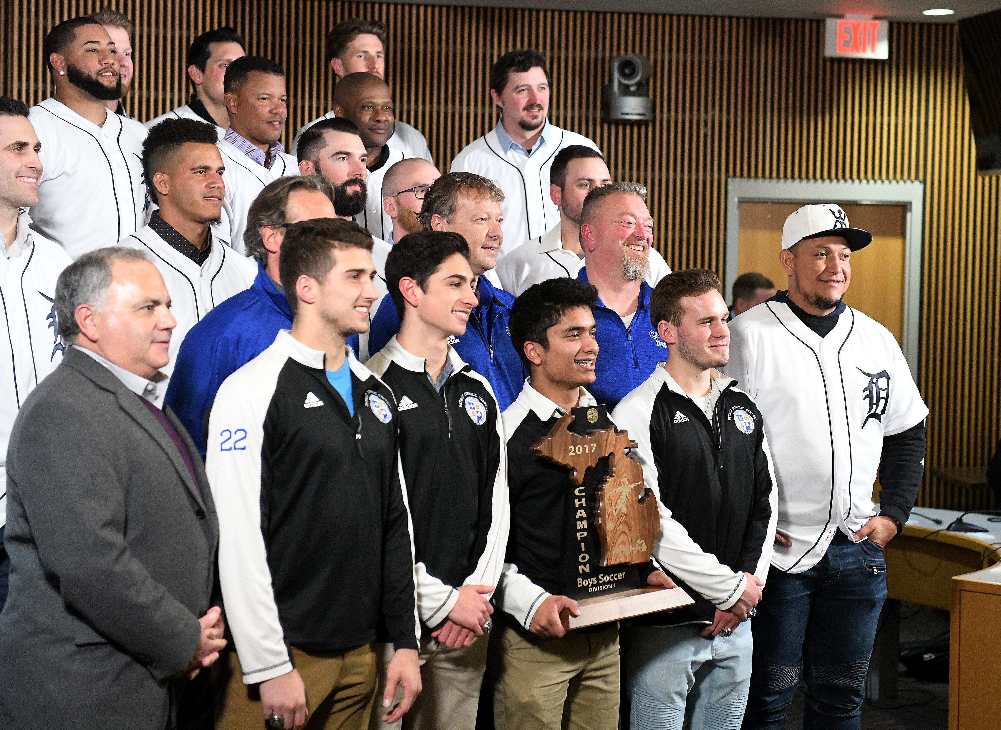 Tigers ' Miguel Cabrera, right, and members of the Detroit Tigers take a group photos with some of the Div. 1 champion Novi soccer players during a stop on the 2019 Detroit Tigers Winter Caravan at the Novi Civic Center in Novi, Mich. on Jan. 24, 2019.