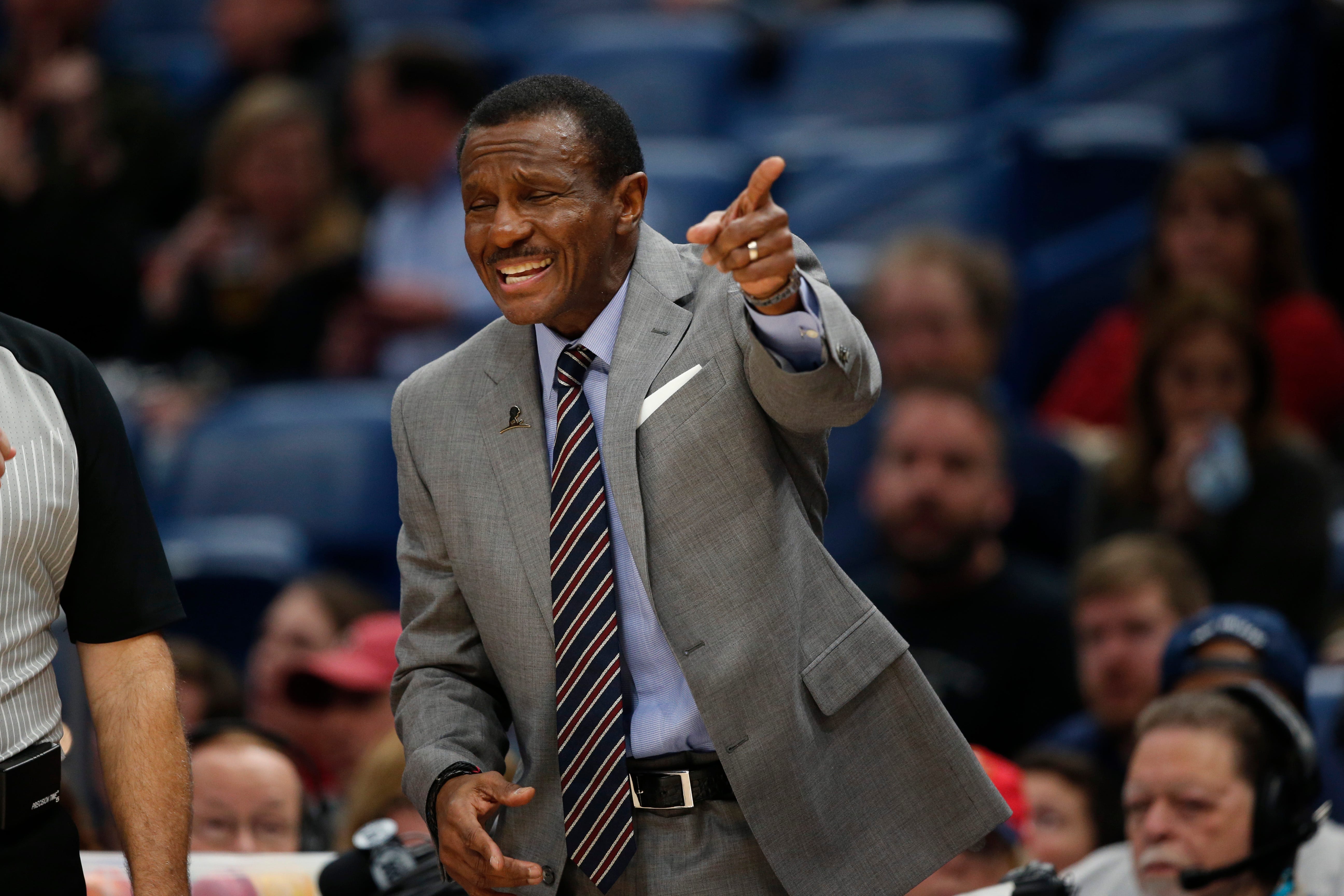 Detroit Pistons coach Dwane Casey questions an official during the second half.