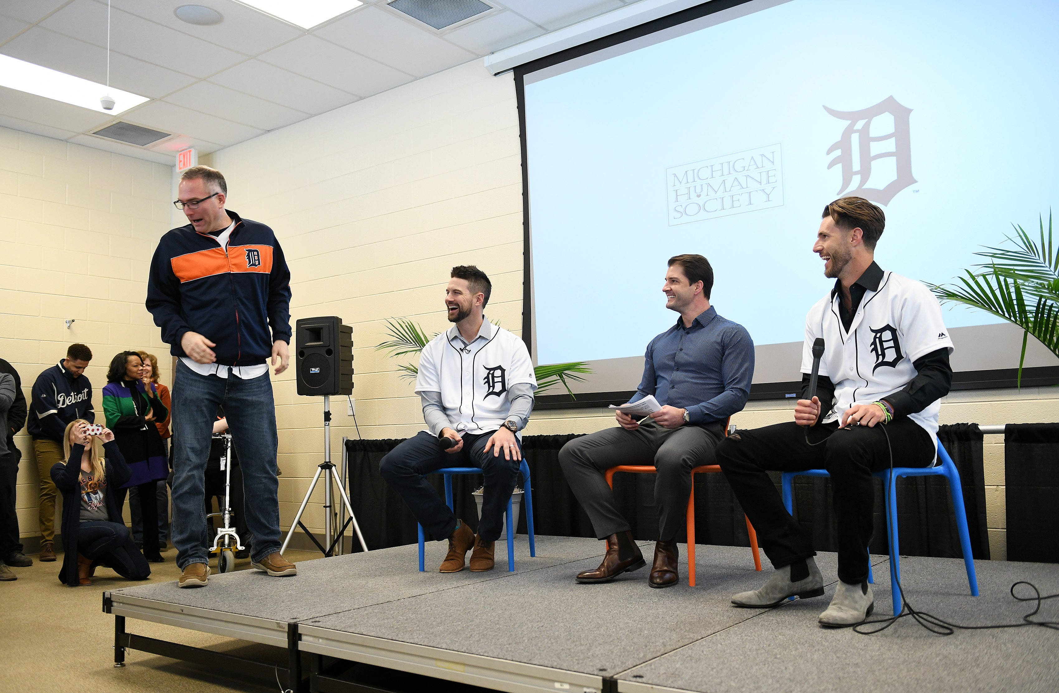 From left, Michigan Humane Society CEO Matt Pepper, Tigers' Jordy Mercer, Johnny Kane from Fox Sports Detroit and Tigers' Shane Greene at the Michigan Humane Society.