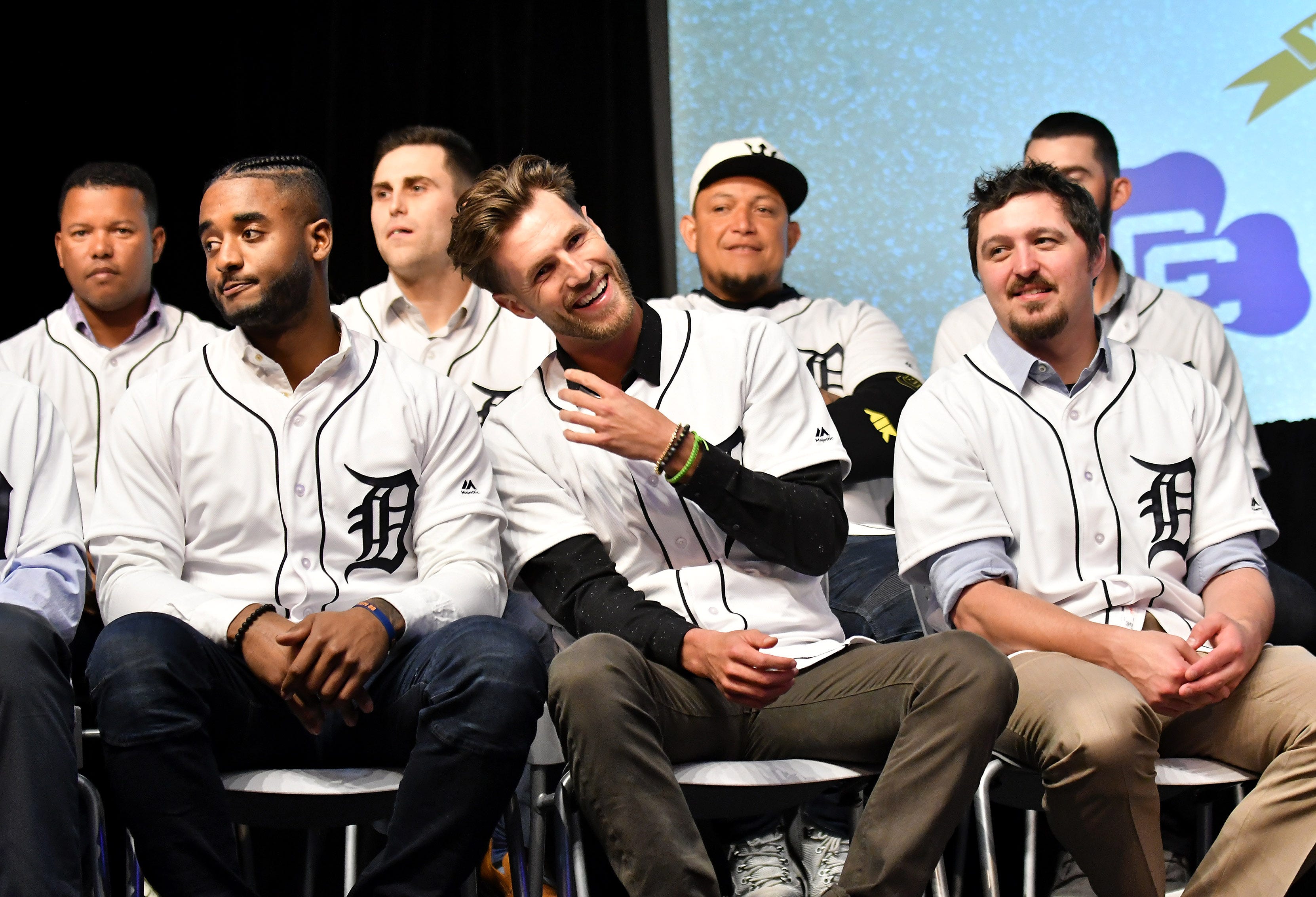 Tigers pitcher Shane Greene, center, laughs between his teammates, Niko Goodrum, left, and Blaine Hardy, right, at the Novi Civic Center.