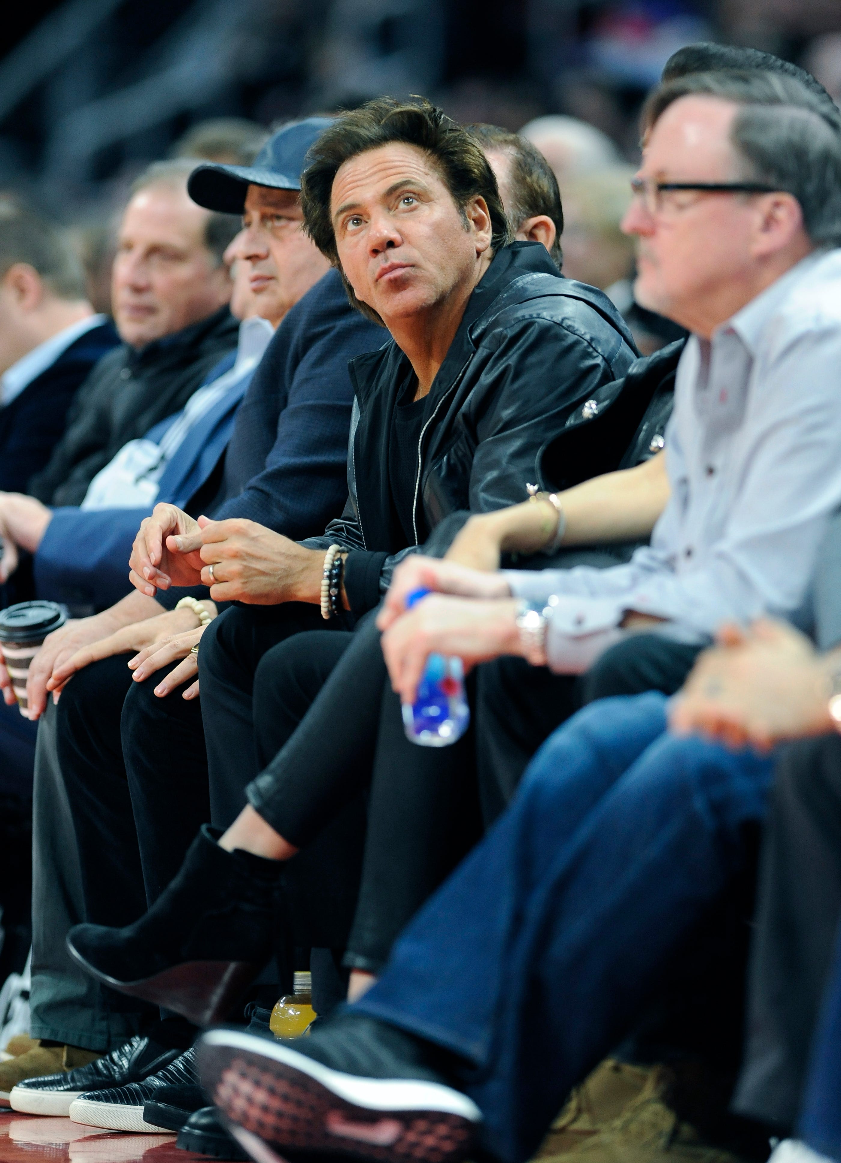Pistons owner Tom Gores looks up to the score board in the fourth quarter.