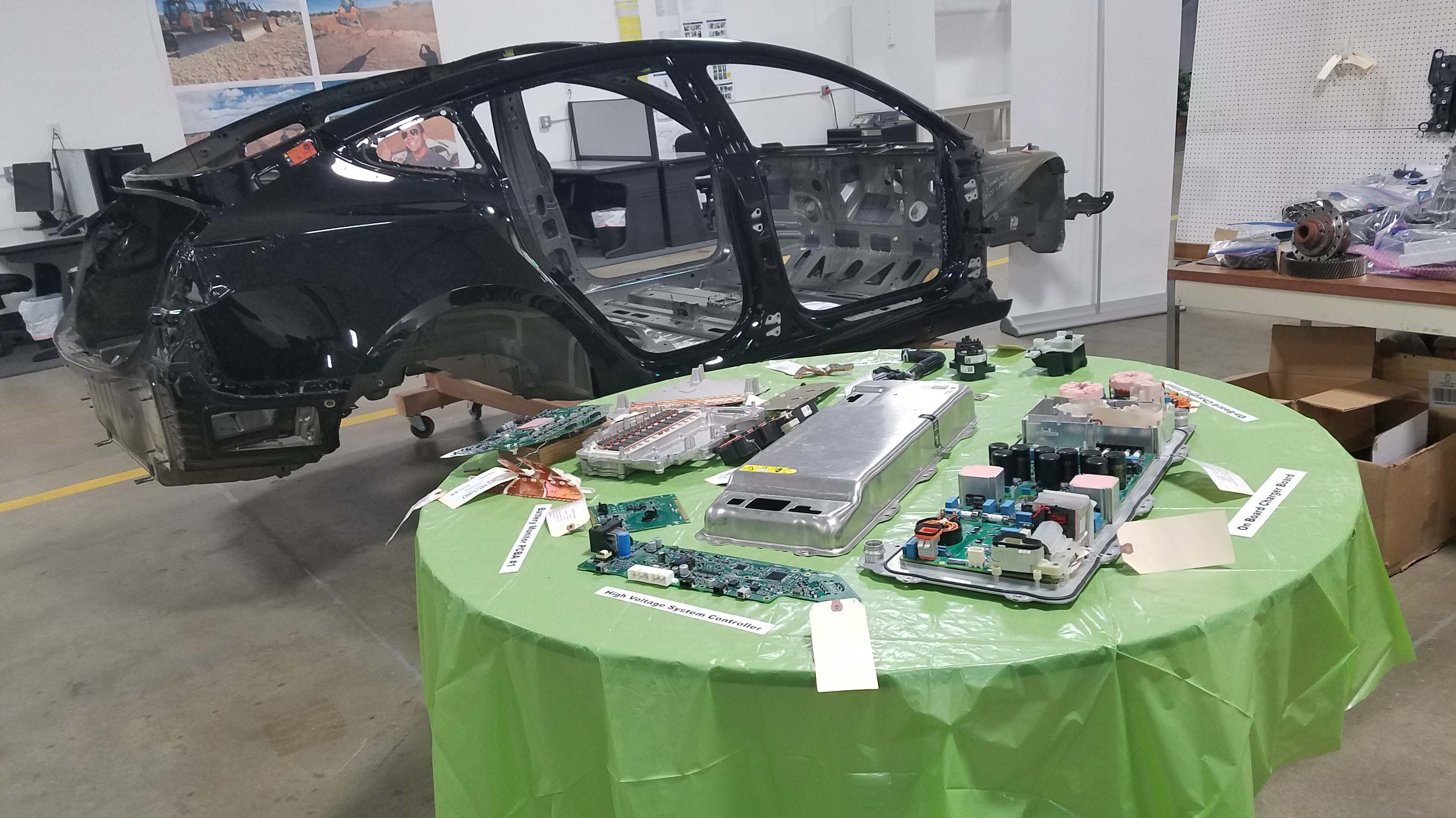 Munro & Assoc. of Auburn Hills dis-assembled a Tesla Model 3 and found its electronic systems (foreground) to be the most-advanced in the auto industry.
