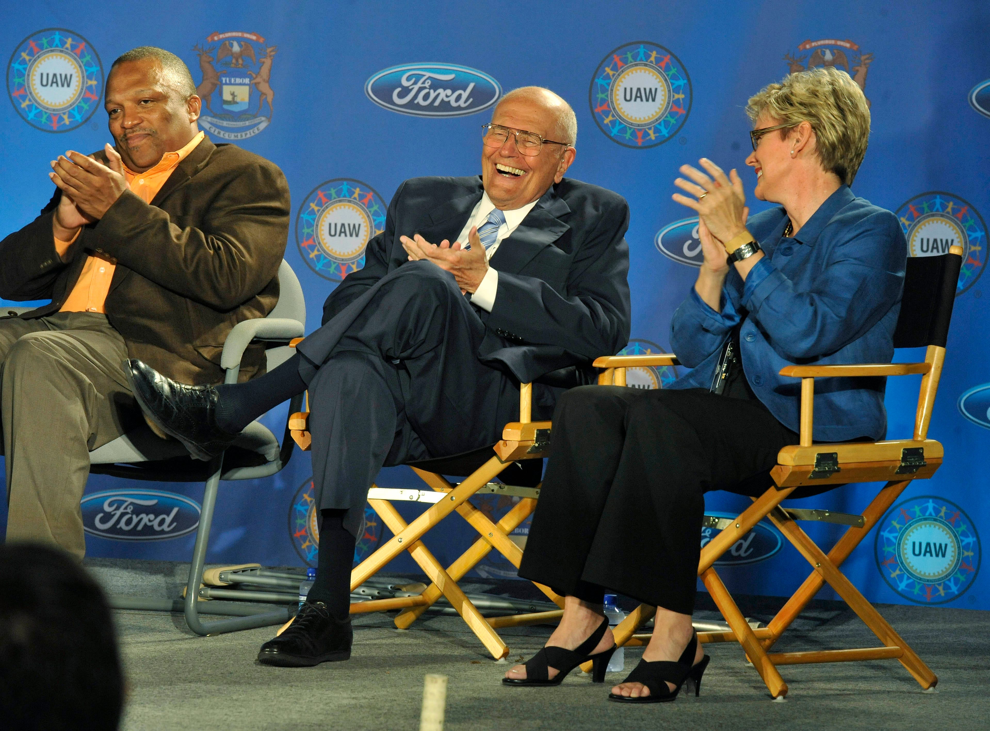 Dingell shares a laugh with Michigan Gov. Jennifer Granholm and UAW official Chuck Hall during an announcement  an concerning electric vehicles at the Ford Rawsonville Plant in Ypsilanti on May 24, 2010.