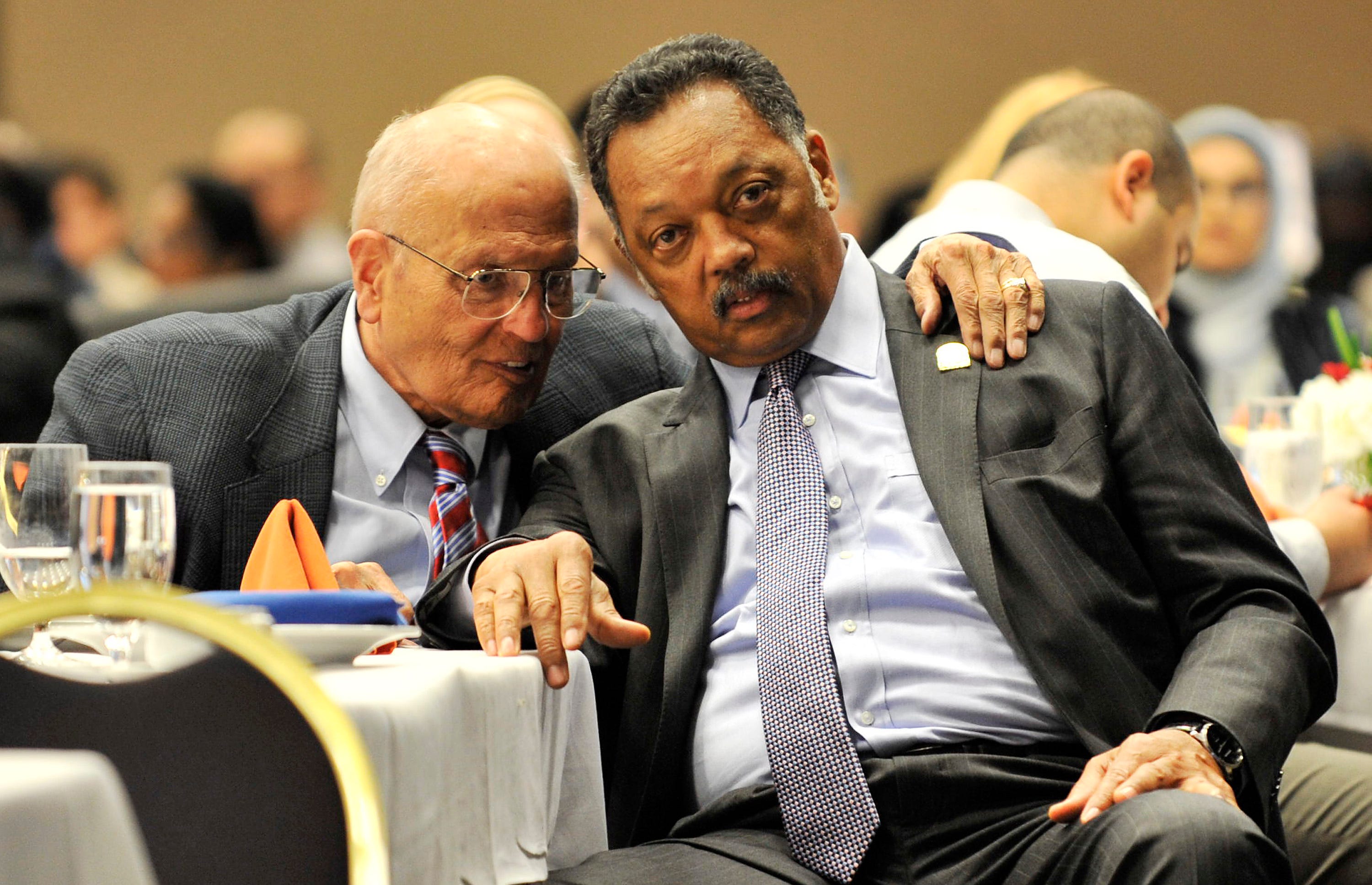 Dingell talks with Rev. Jesse Jackson, president of the Rainbow/PUSH Coalition,  at the 10th annual fundraising banquet for the Council on American Islamic Relations Michigan chapter at the Hyatt Regency in Dearborn on March 28, 2010.