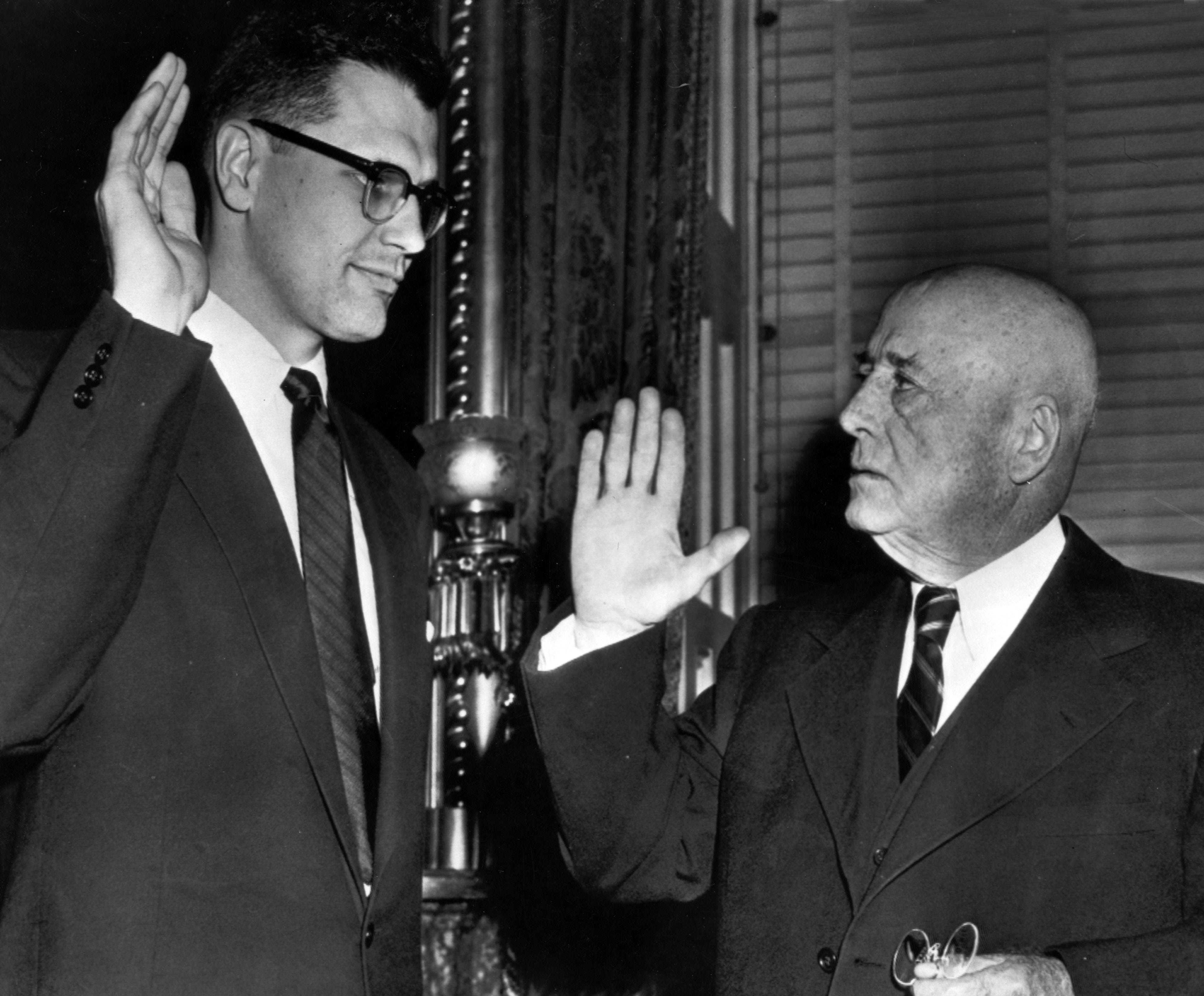 In 1955, John Sr. died and John Jr. won a special election to succeed him in the U.S. House. 
Above, Dingell is sworn in as a Congressman in 1956.