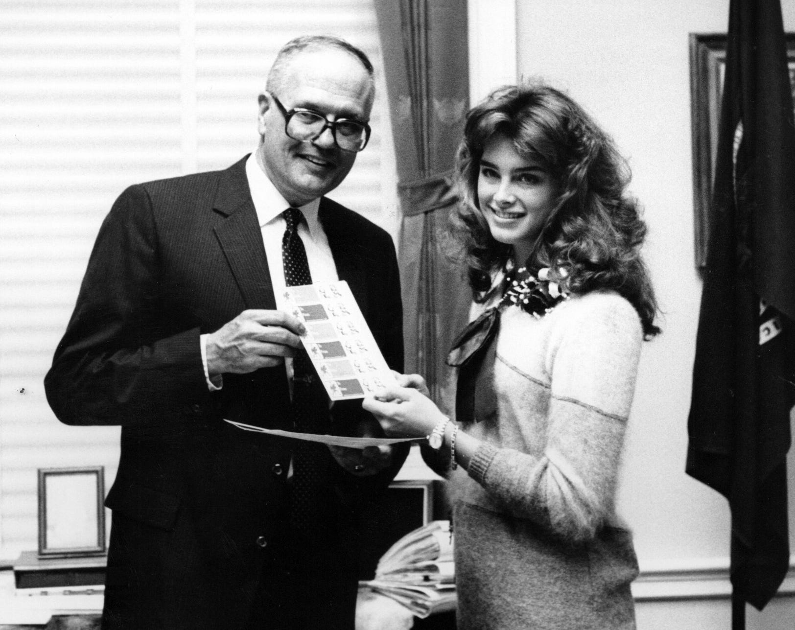 John Dingell and actress Brooke Shields are seen in an undated photo.