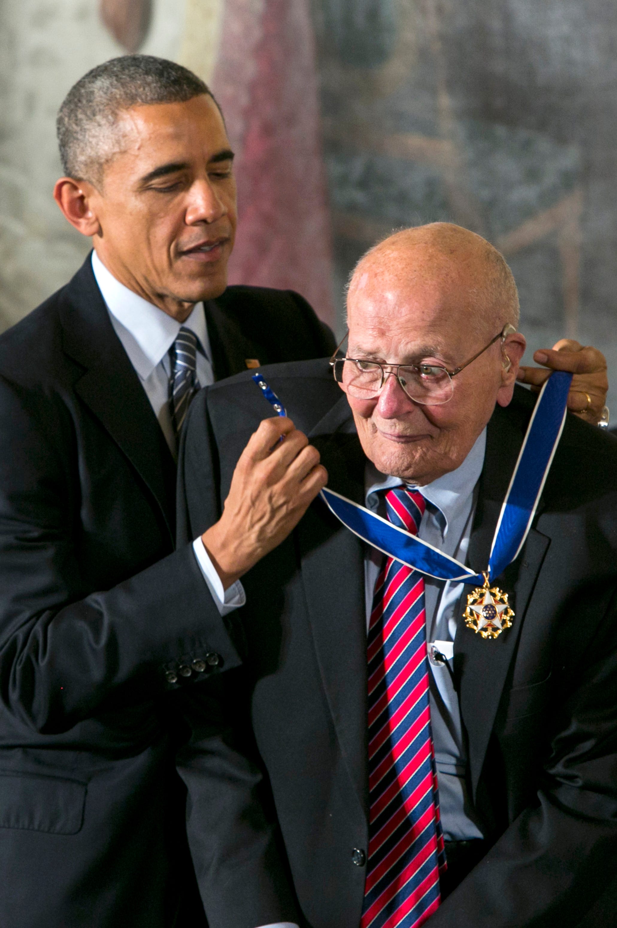 President Barack Obama awards Rep.  John Dingell Jr. the Presidential Medal of Honor at the White House on November 24, 2014. It is the nation’s highest civilian honor, presented to individuals who have made especially meritorious contributions to the security or national interests of the United States.  Obama described Dingell as “one of the most influential legislators of all time.”